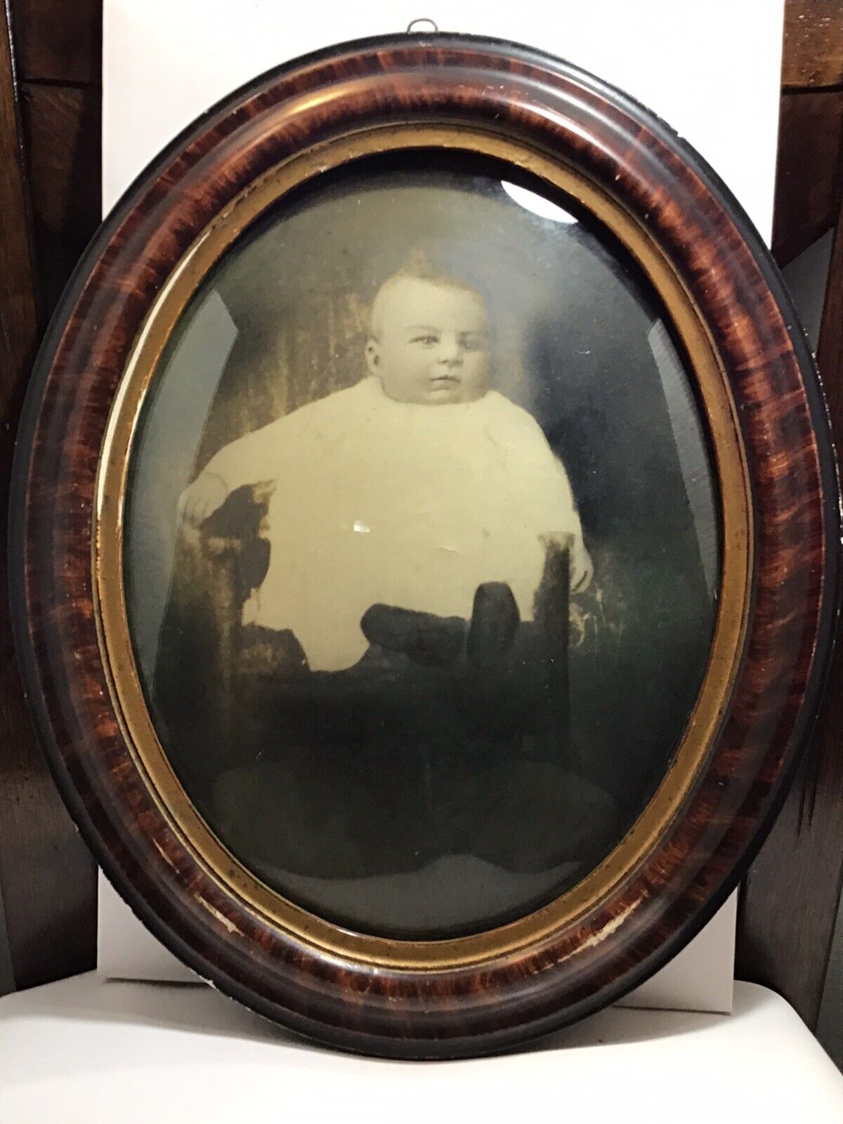 Antique bubble framed baby photograph