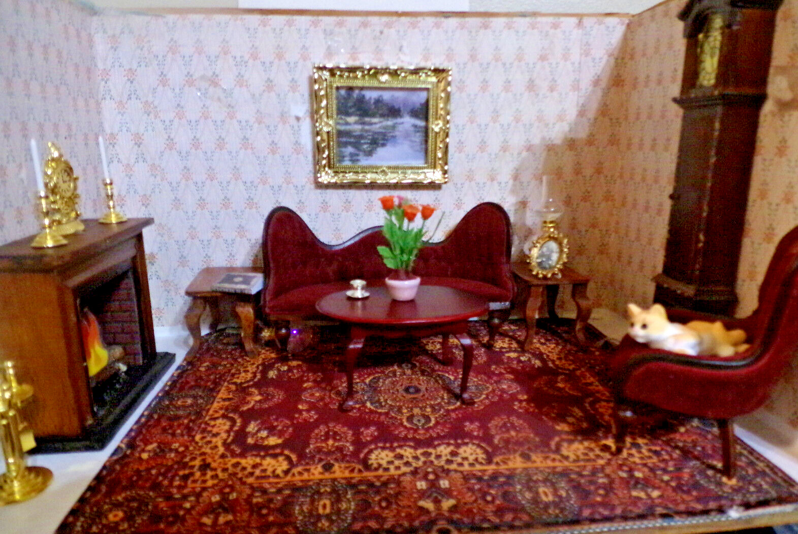 Beautiful victorian deep burgany sofa and chair, fireplace, clock rug.