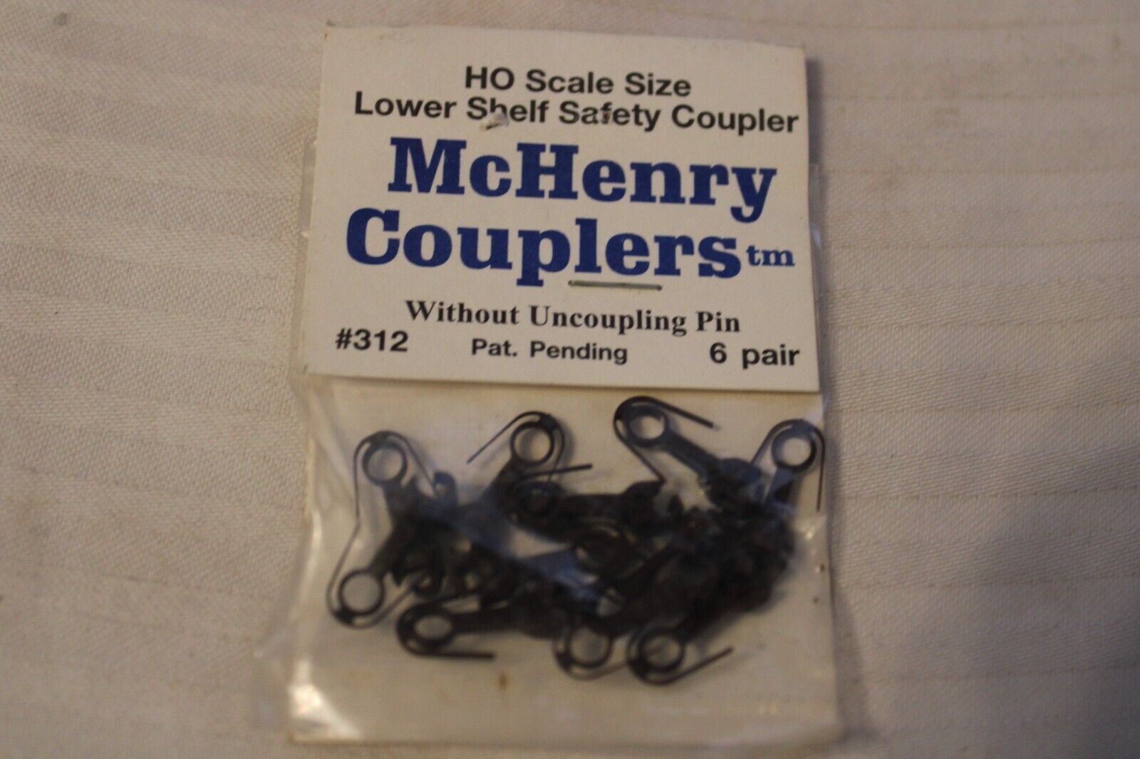 HO Scale McHenry Couplers, Package of 12, #312 Couplers without uncoupling pins