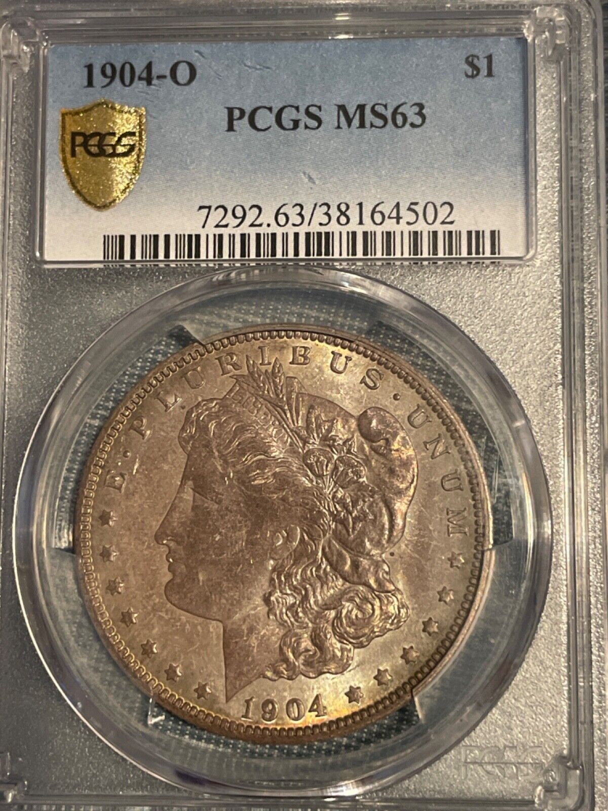 Iridescent Toned 1904-O $1 Morgan Silver Dollar MS63 • PCGS Gold Shield