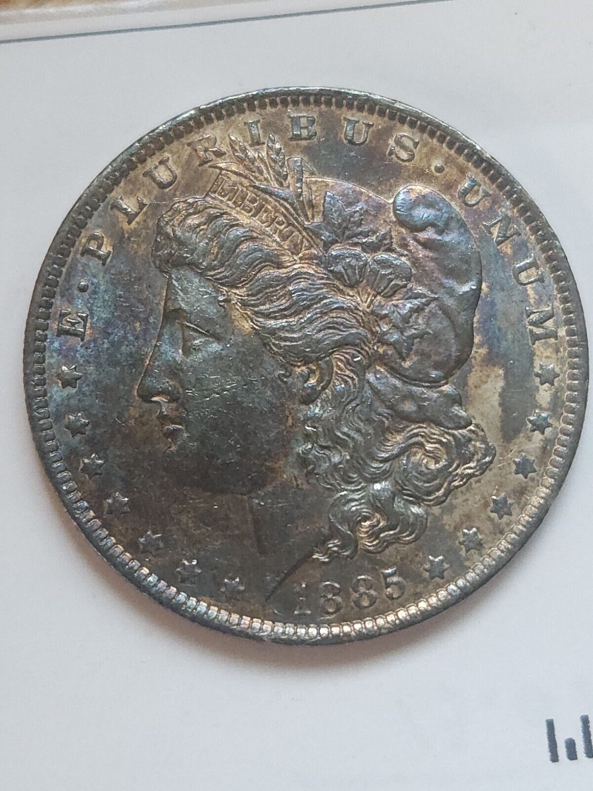 1885 O Morgan Dollar Bu Monster Toned