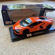 Maisto Special Edition 1:18 Scale Lamborghini Revuelto Diecast Model - Orange picture