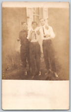 RPPC Postcard~ Three Young Men Holding Drinks picture