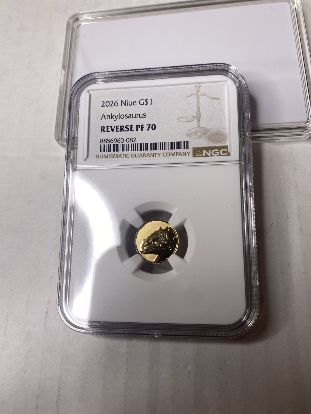 2026 Niue $1 Ankylosuarus 1 gram 22 kt gold Reverse PF70 2026 Niue $1 Ankylosuarus 1 gram 22 kt gold Reverse PF70