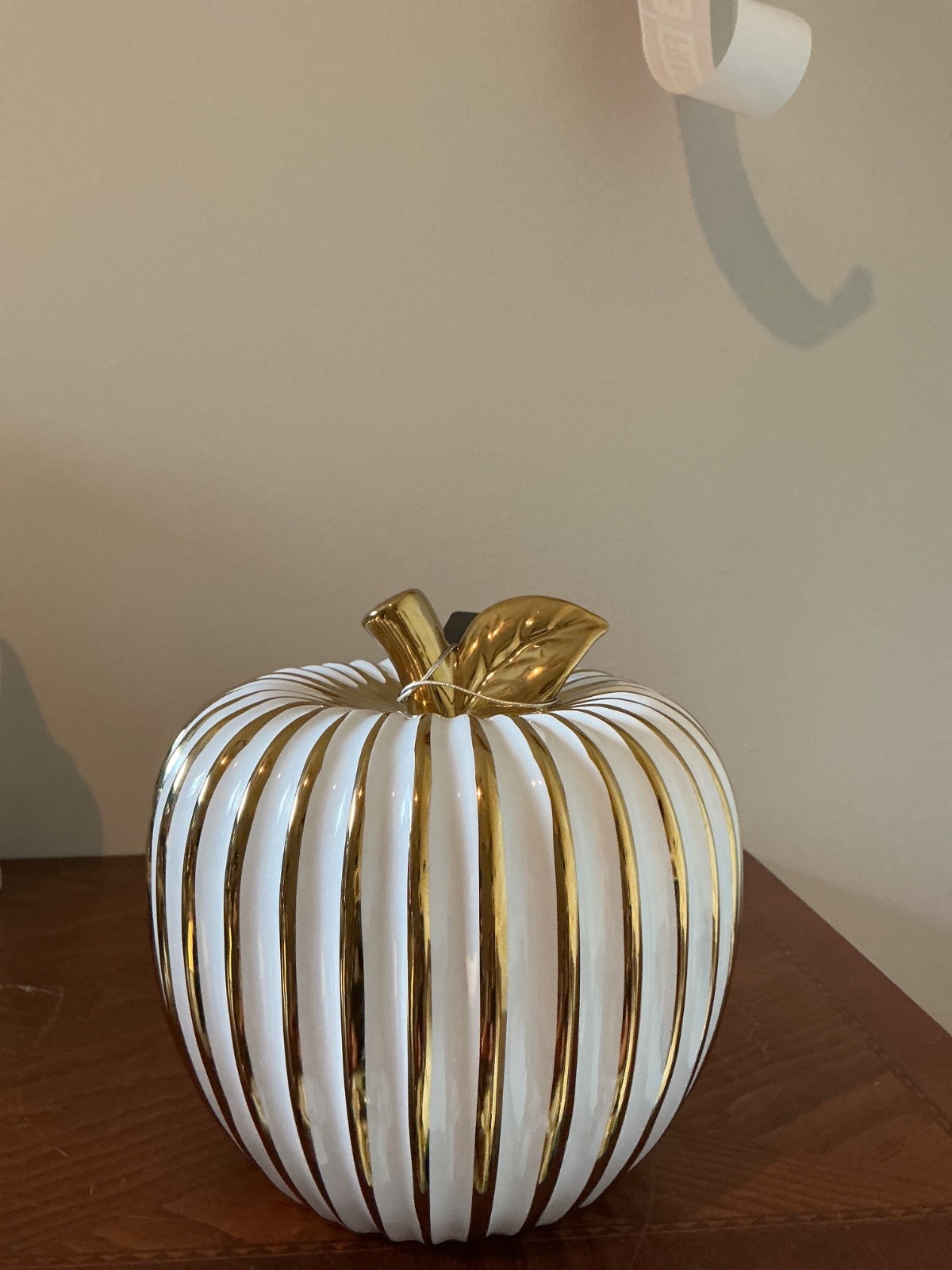 Tahari white and gold striped apple sculpture