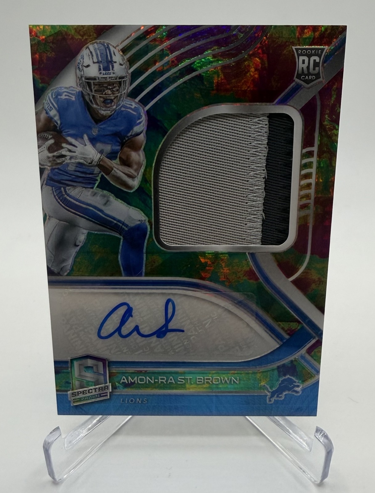 2021 Spectra Rookie Patch Auto Amon-Ra St. Brown Celestial RPA /99 RC Lions