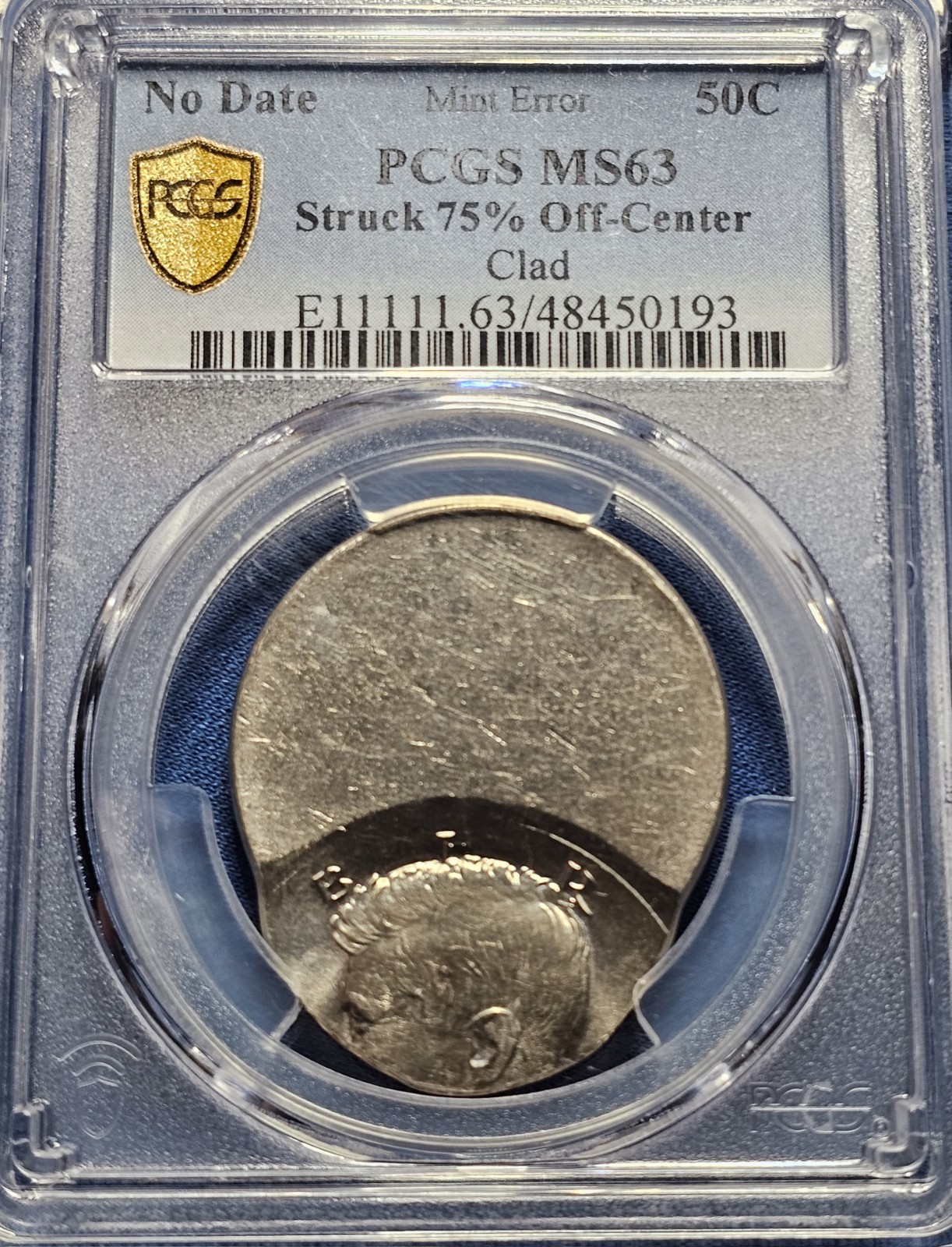 No Date 50c Kennedy Half Struck 75% Off-Center PCGS MS63. Cool Error