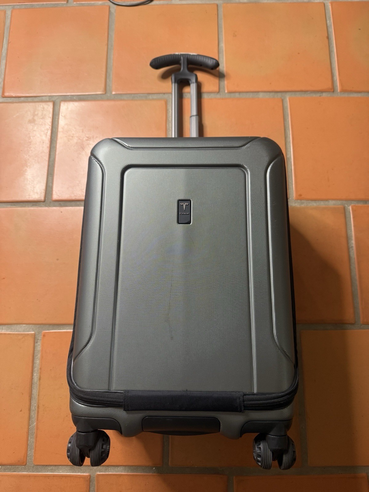 Rare TESLA 22” Carry On Wheel Suitcase Gray Never Released read Broken Handle Rare TESLA 22” Carry On Wheel Suitcase Gray Never Released read Broken Handle