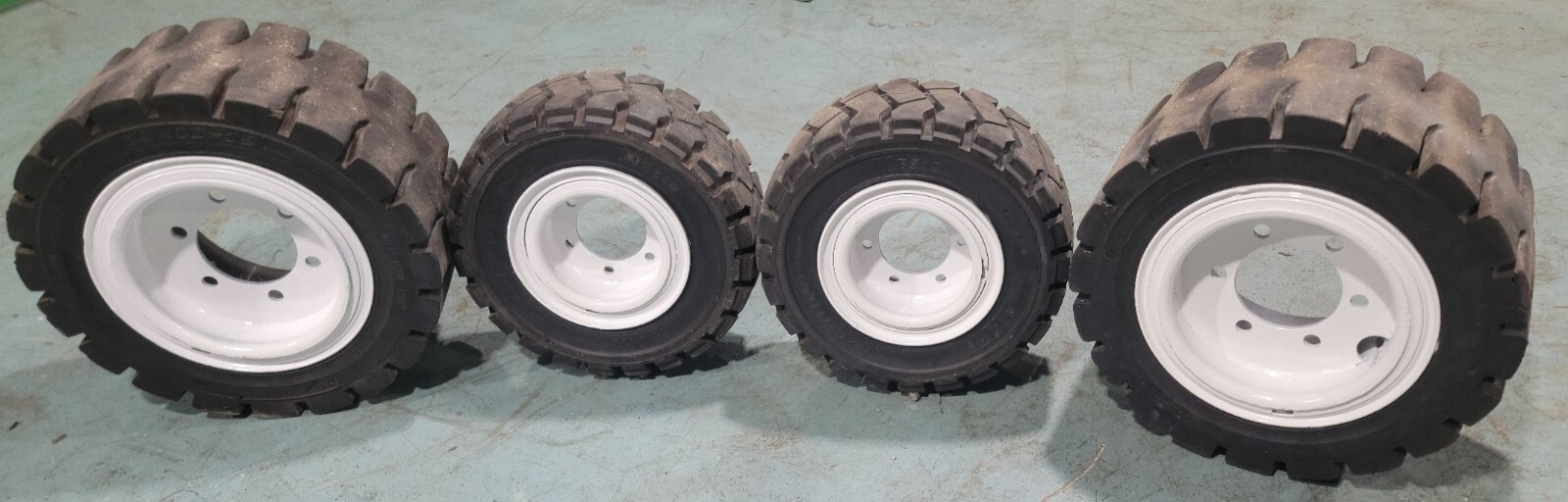 Nice Clean set of Solid Industrial Forklift Tires and Wheels Yale Hyster