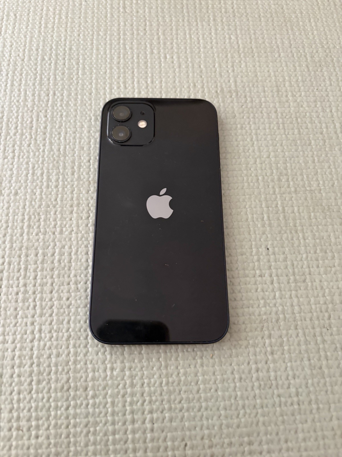 Apple iPhone 12 64gb black AT&T used amazing condition scuffs shown in pics