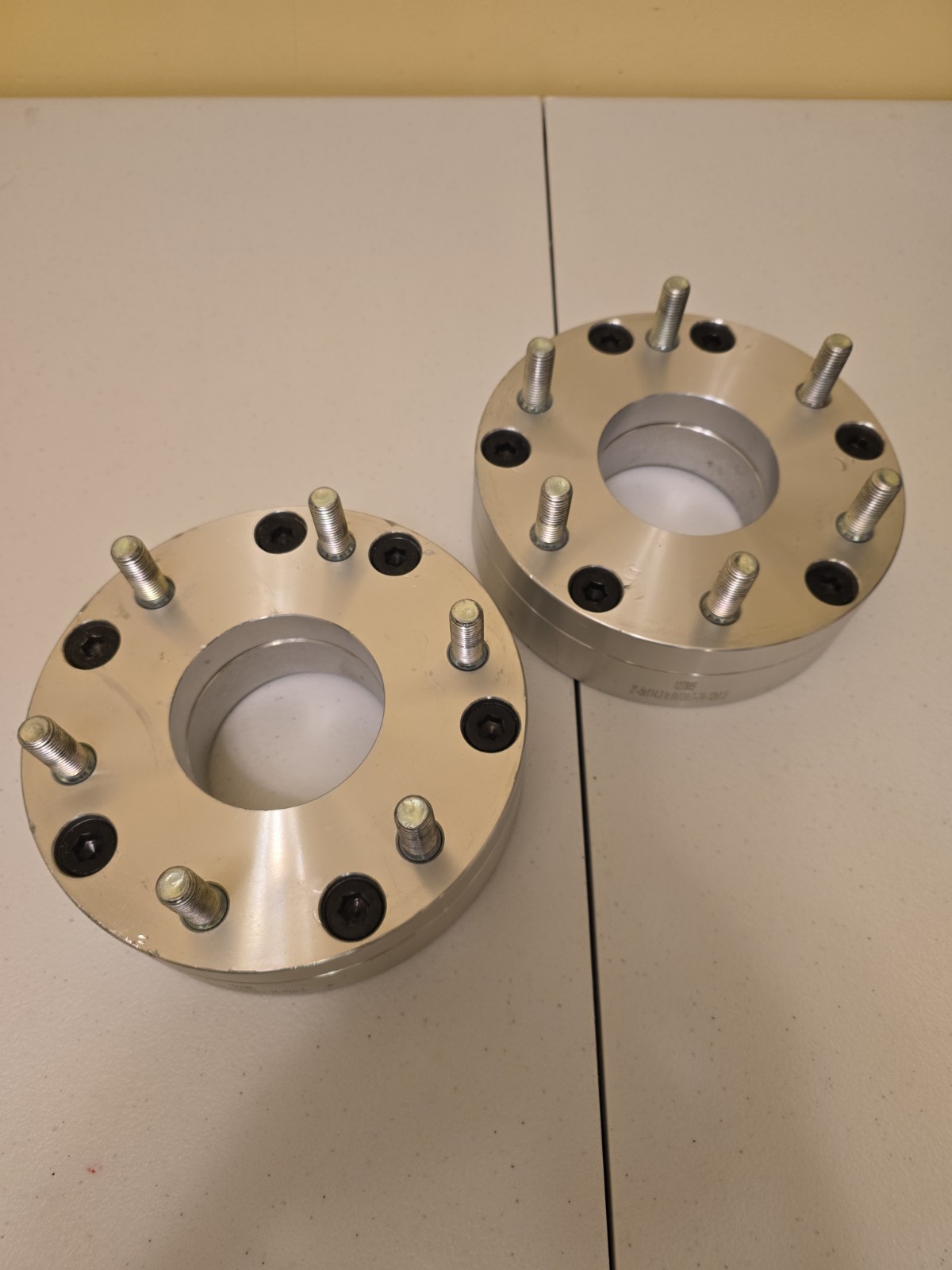 These are 2-inch thick aluminum wheel adapters designed to convert a... These are 2-inch thick aluminum wheel adapters designed to convert a...