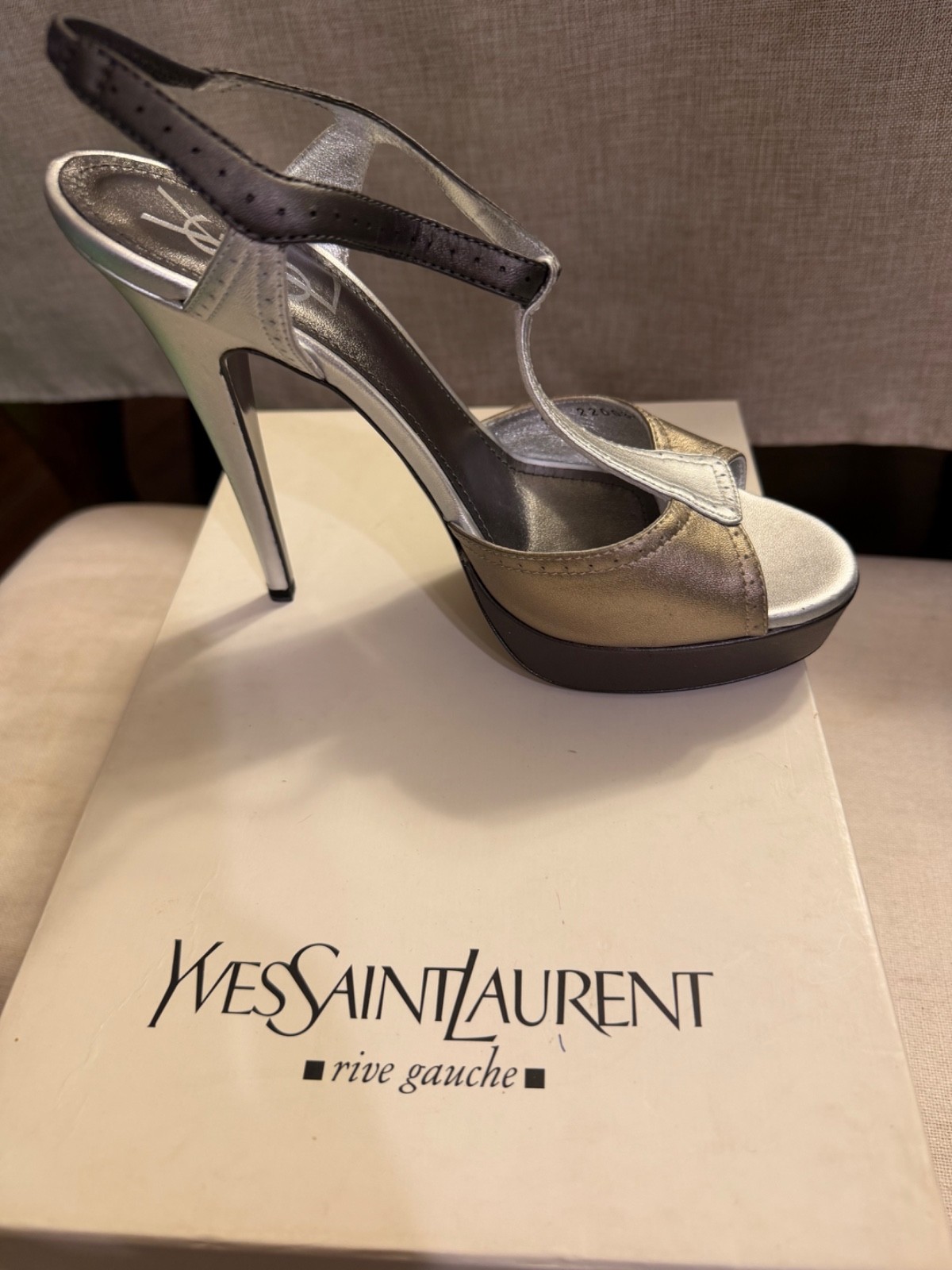 Beautiful vintage YSL leather stiletto heels featuring an elegant silver and gol