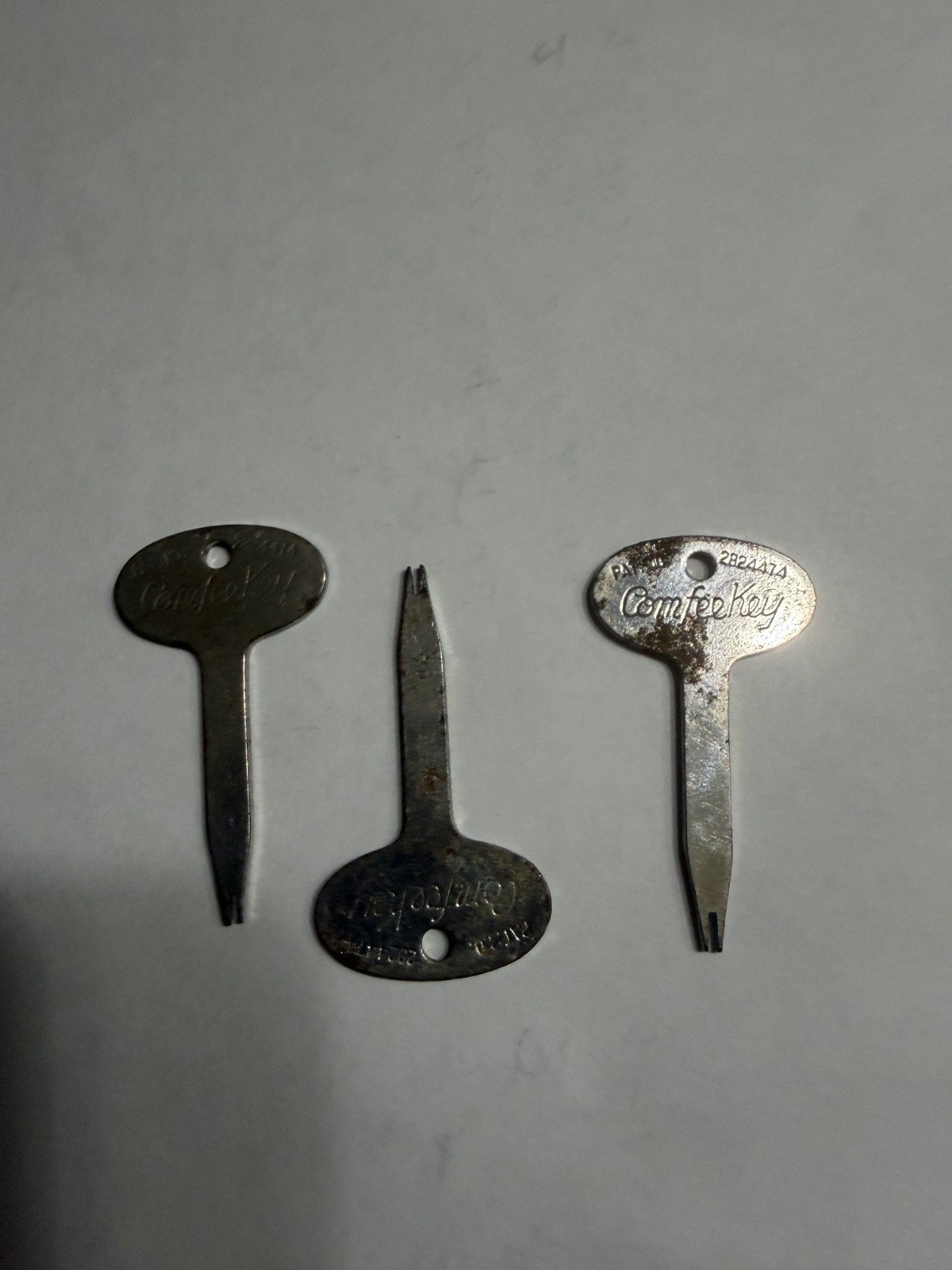 Three vintage steel speciality keys