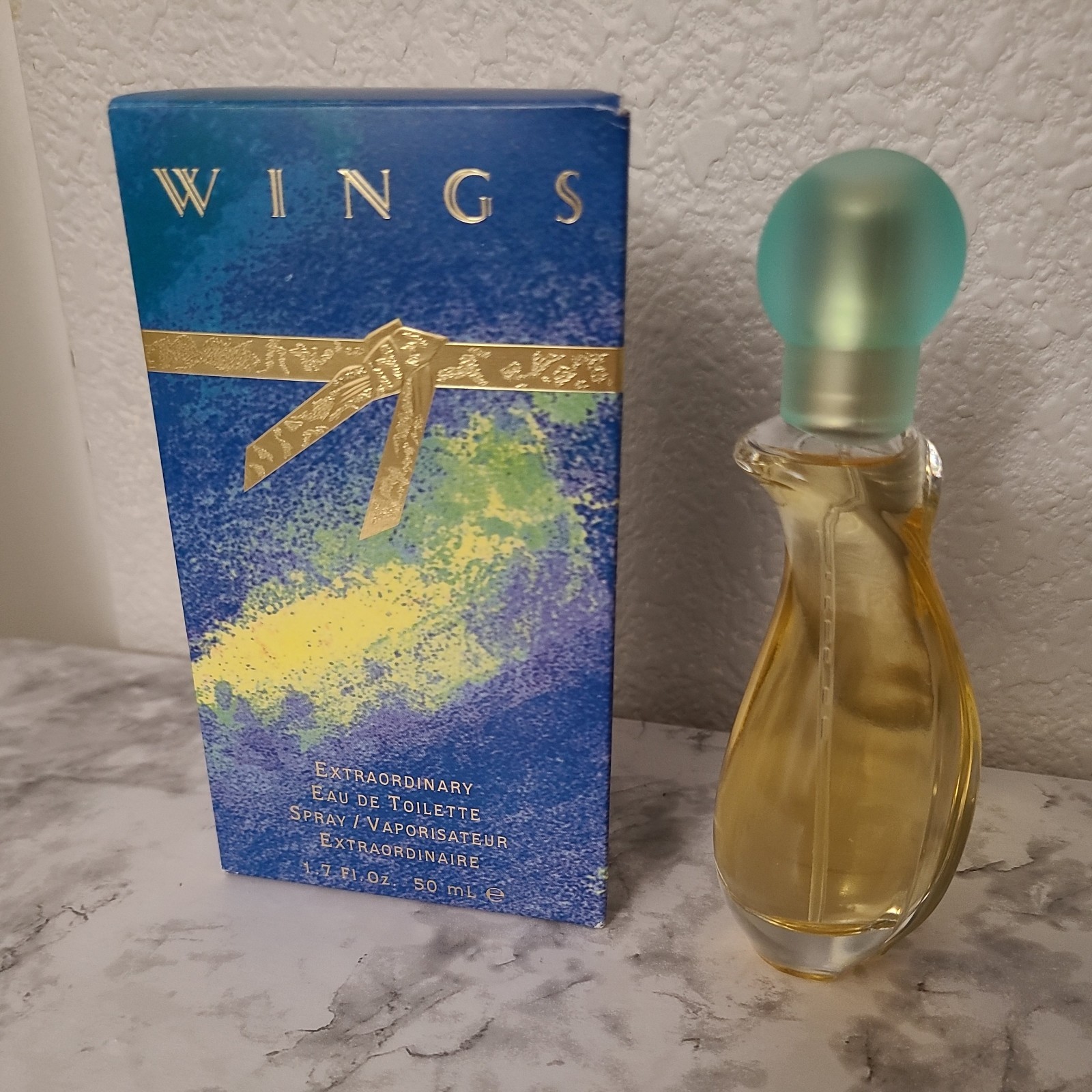 Wings Wings Extraordinary Eau de Toilette Spray 1.7 fl oz Regular Size