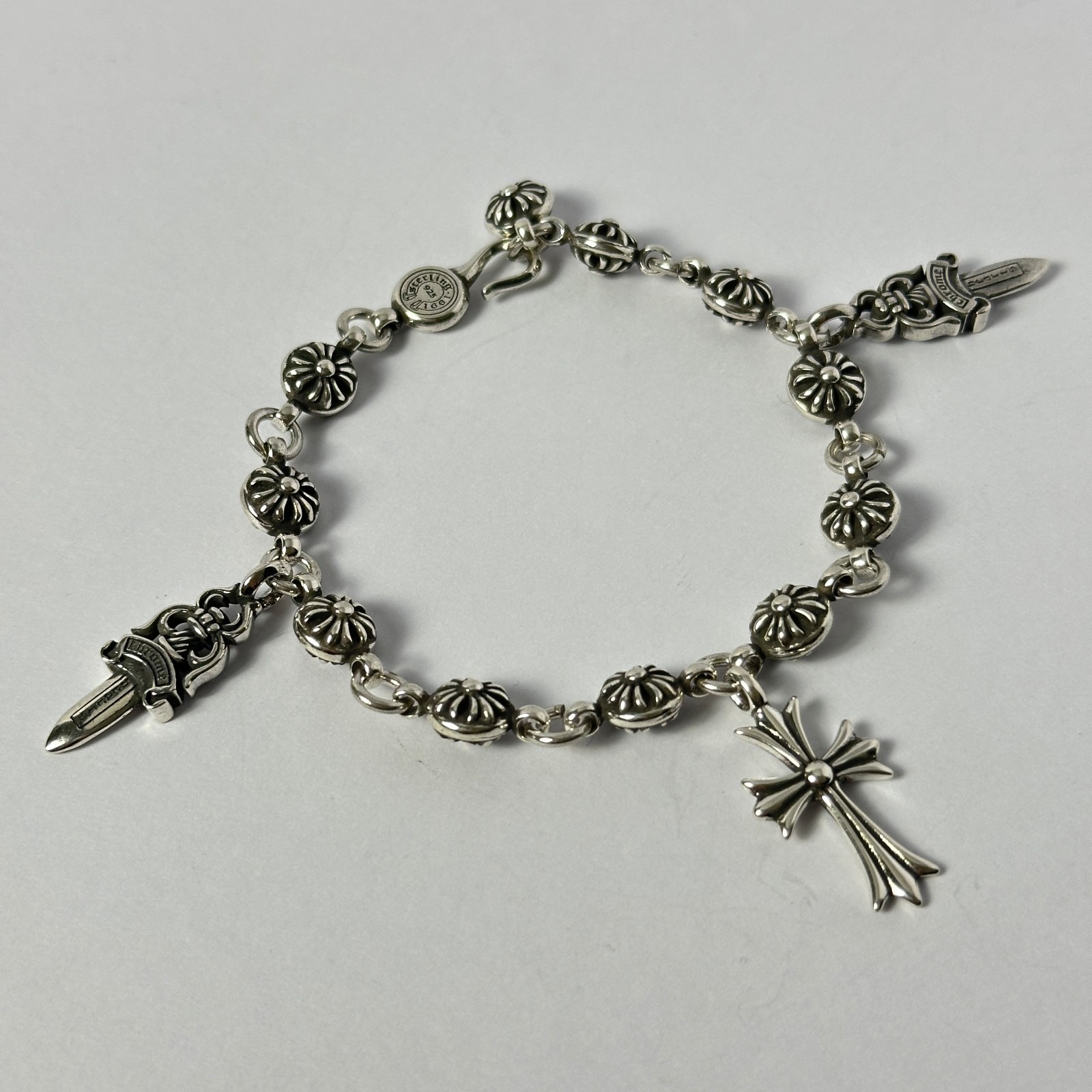 Chrome Hearts 925 Silver Cross Ball Adjustable Bracelet with Cross and Daggers Chrome Hearts 925 Silver Cross Ball Adjustable Bracelet with Cross and Daggers