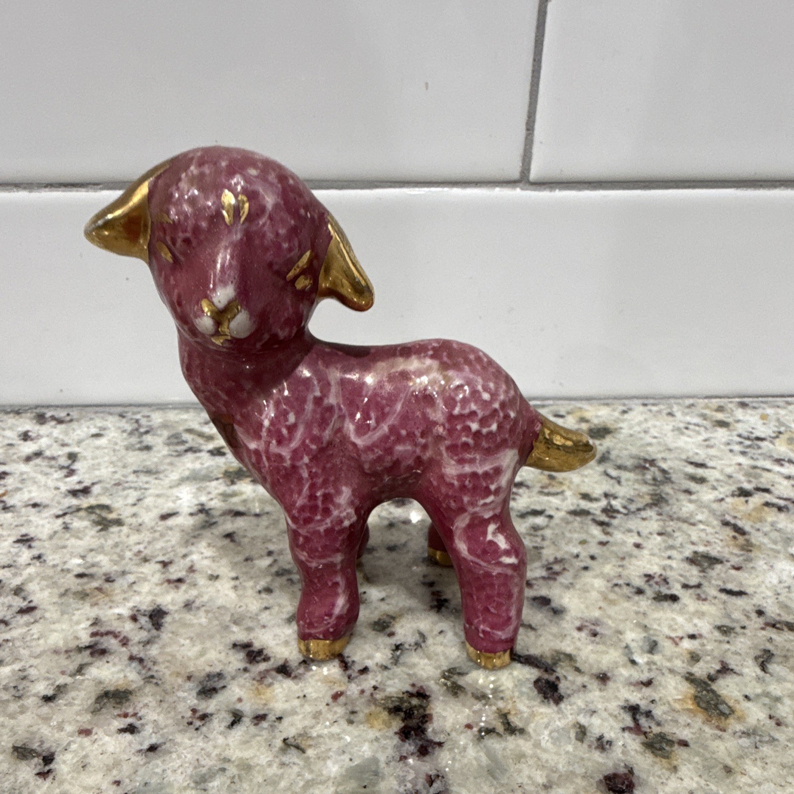 Vintage mid-20th-century pink ceramic lamb figurine. Pink glaze and gold trimmed Vintage mid-20th-century pink ceramic lamb figurine. Pink glaze and gold trimmed