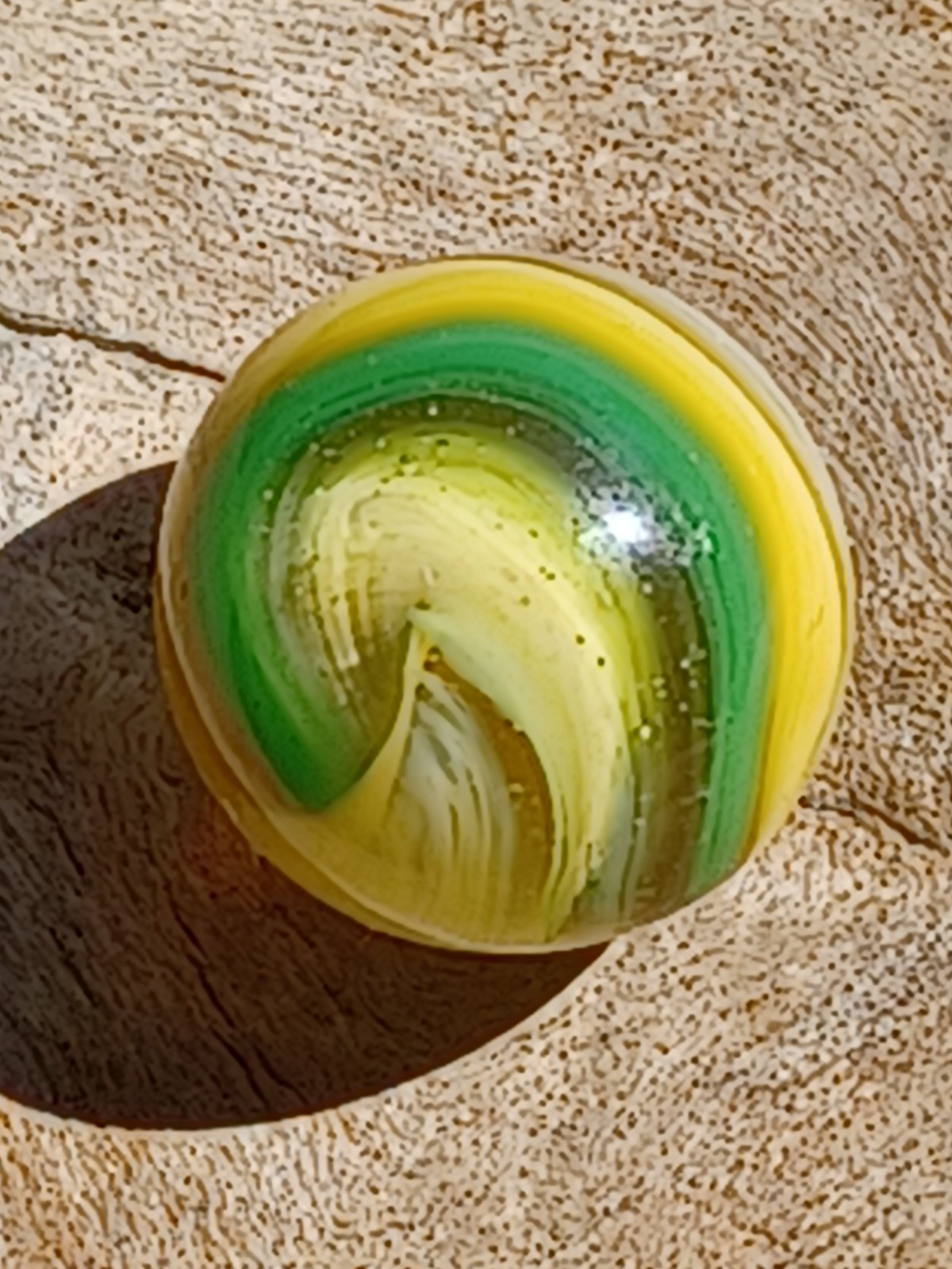 .63 Beautiful very Wispy intricate Wet Mint Green/Yellow Popeye marble.. .63 Beautiful very Wispy intricate Wet Mint Green/Yellow Popeye marble..