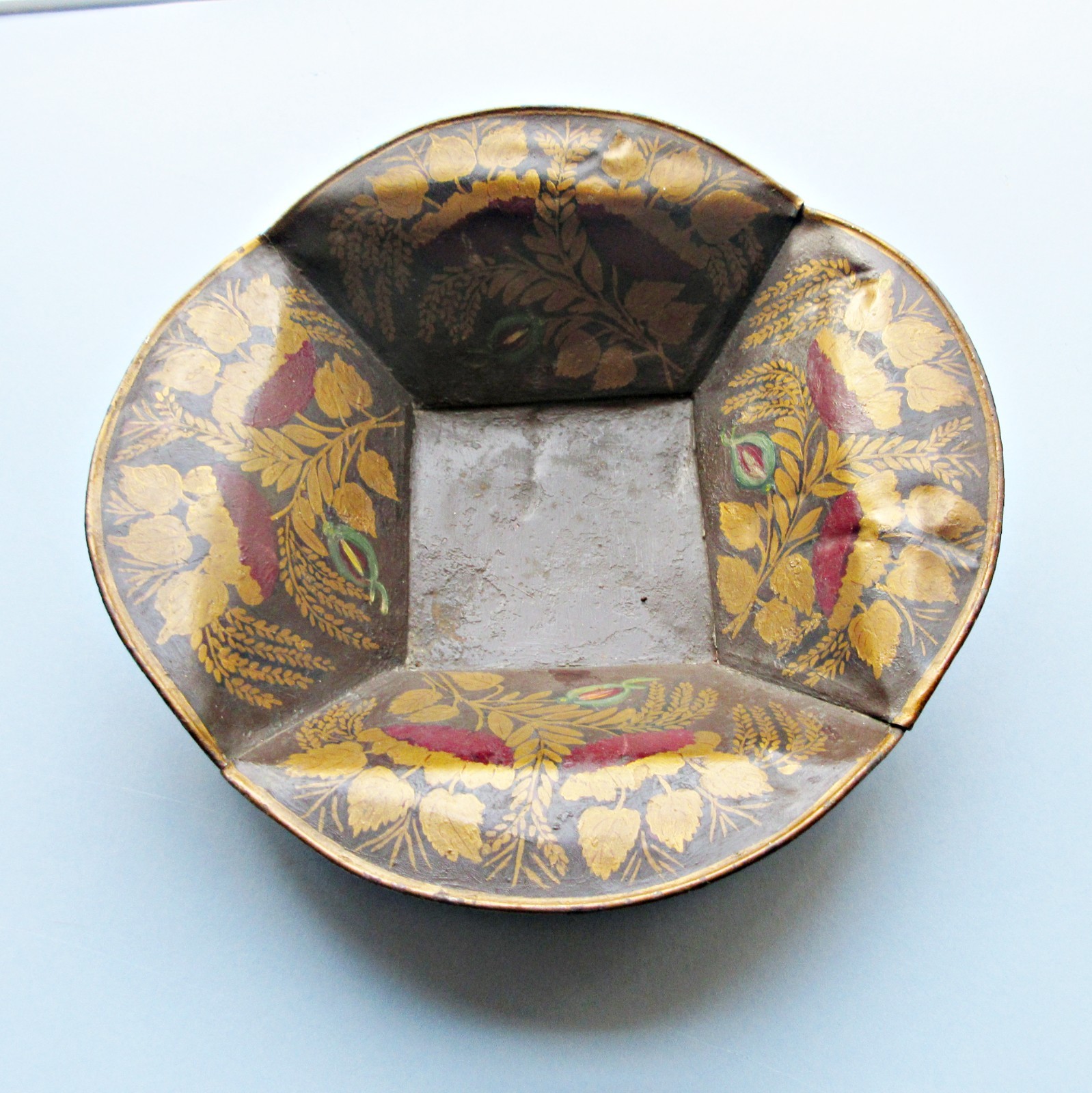 A 19th-century American tole basket with floral decoration