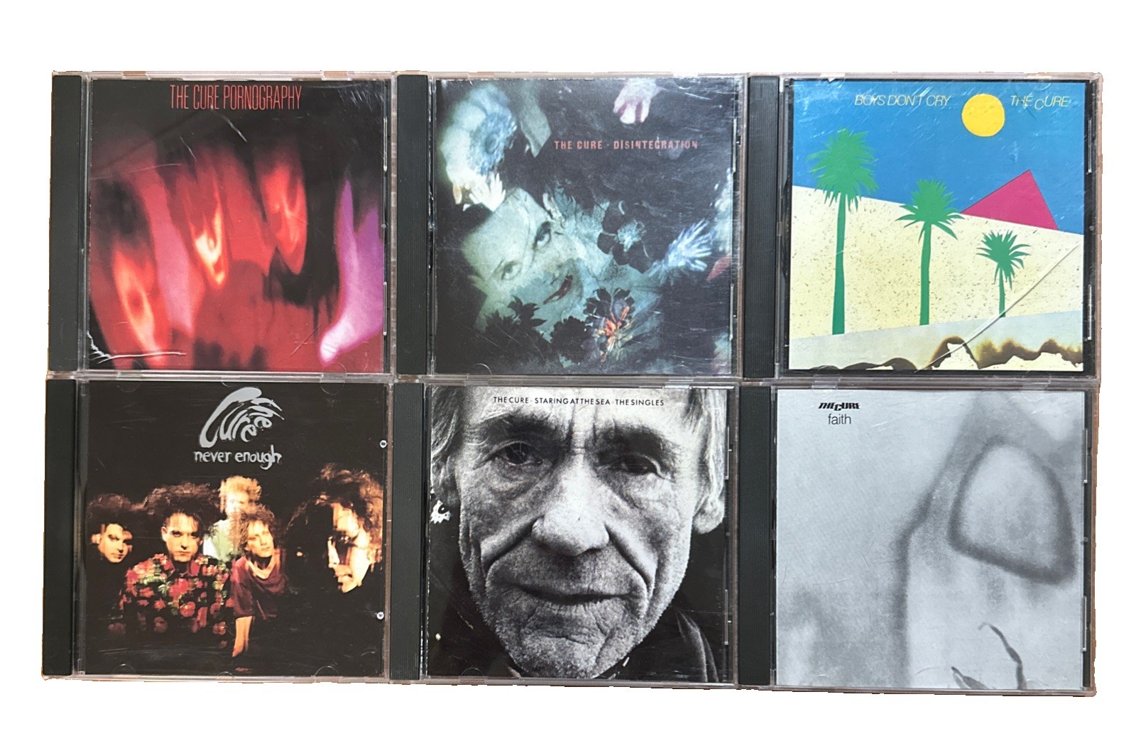(7) The Cure CD Lot