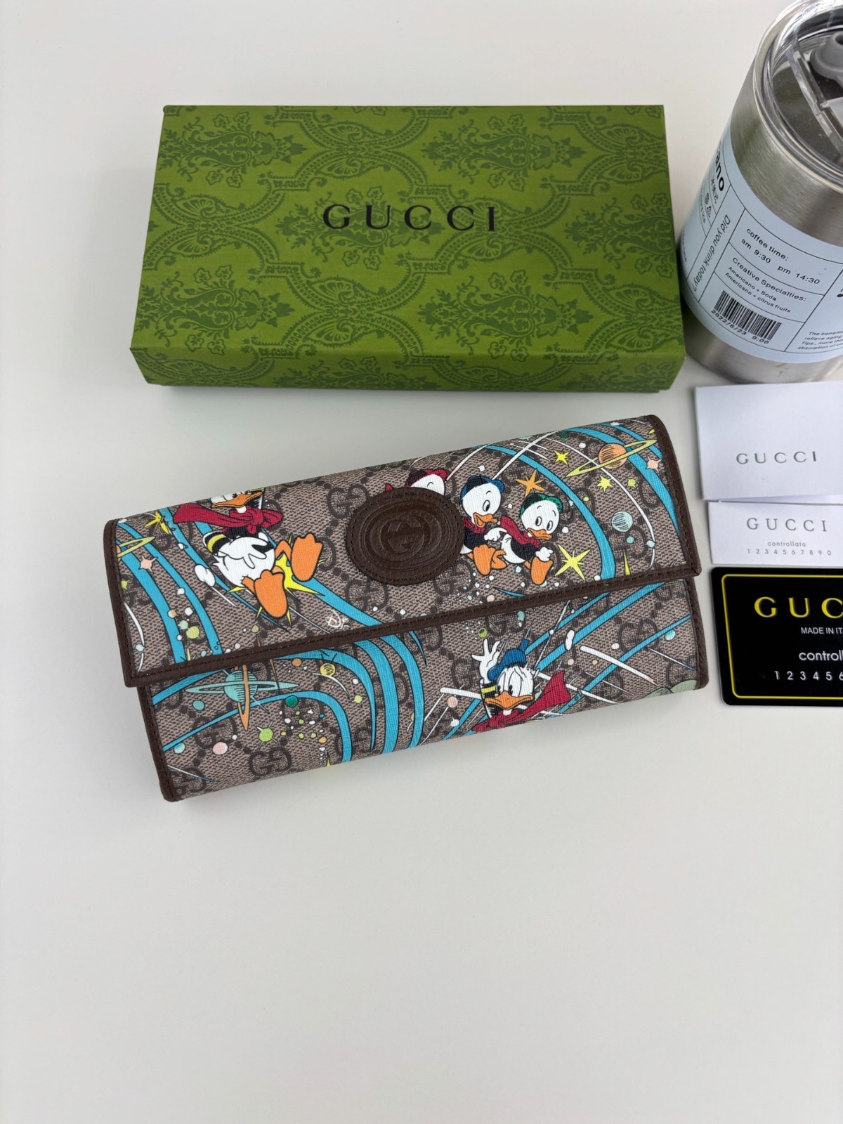 Gucci x Disney Donald Duck & Space Printed GG Supreme Flap Wallet 647828