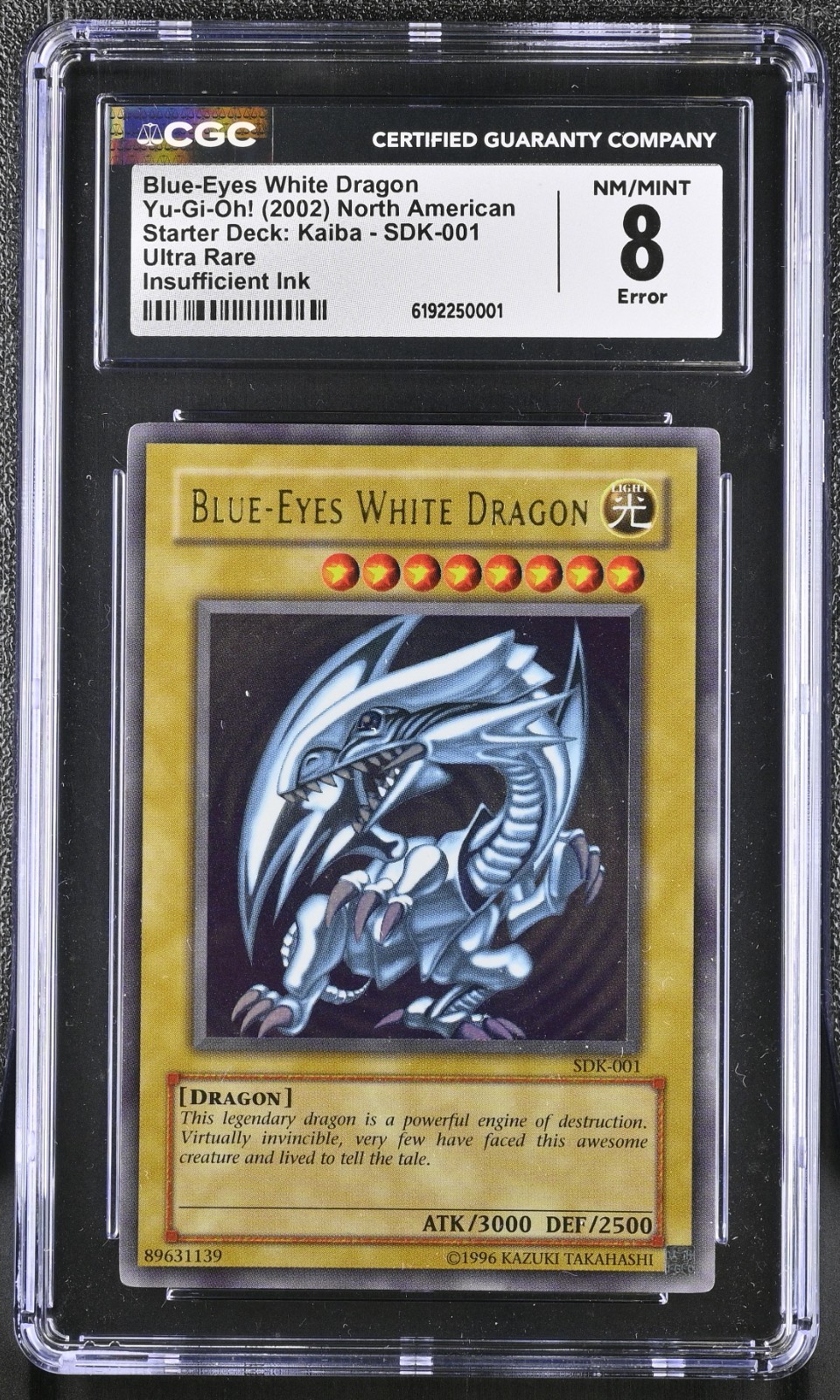 2002 Yu-Gi-Oh Blue-Eyes White Dragon SDK-001 Ultra Rare CGC 8 Error Holo Bleed 2002 Yu-Gi-Oh Blue-Eyes White Dragon SDK-001 Ultra Rare CGC 8 Error Holo Bleed