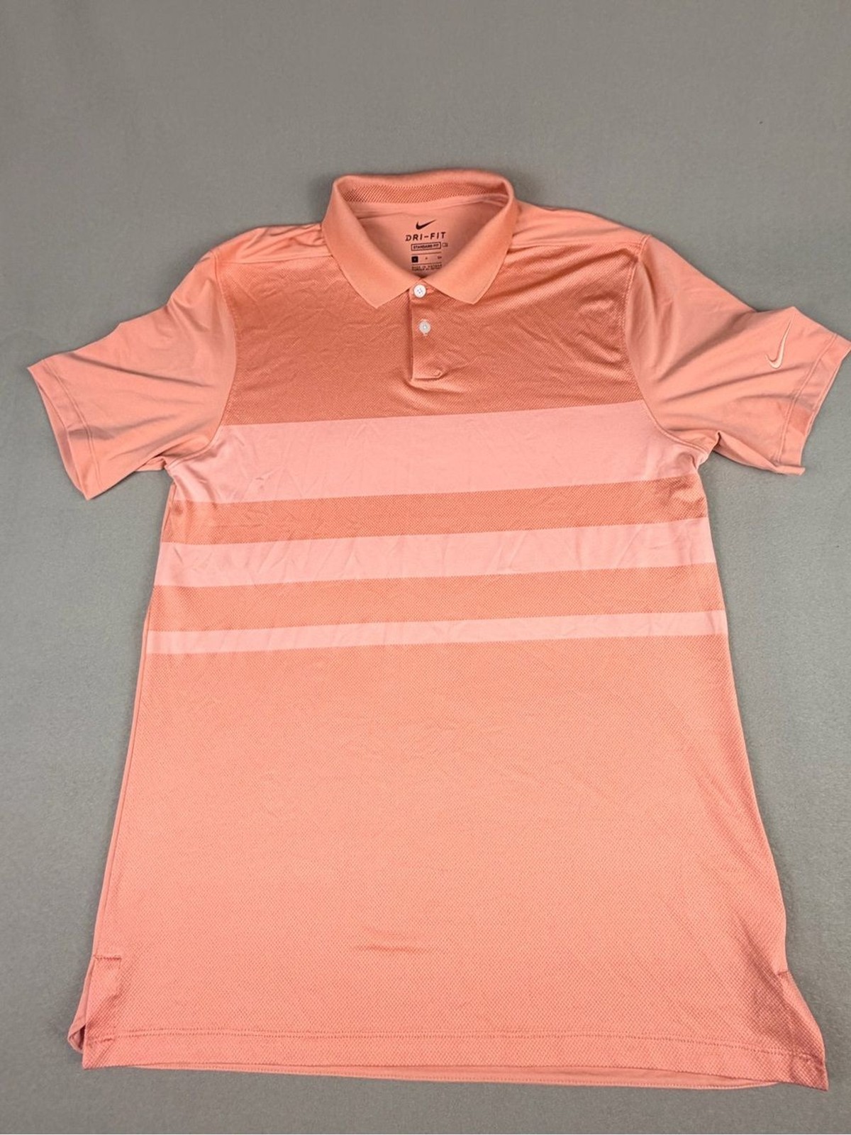 Nike Men’s Dri-FIT Polo in Coral Peach - Standard Fit.