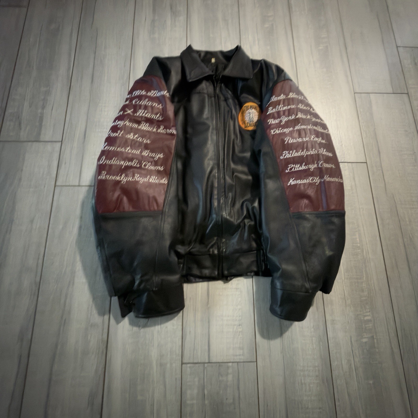 CUSTOM NEGRO LEAGUE LEATHER JACKET WITH SEWN ON PATCHES AND EMBROIDERED TEAMS