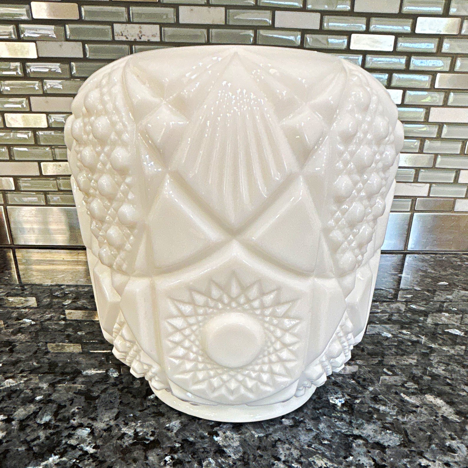 Vintage Fostoria milk glass rose bowl featuring the intricate Vintage Fostoria milk glass rose bowl featuring the intricate