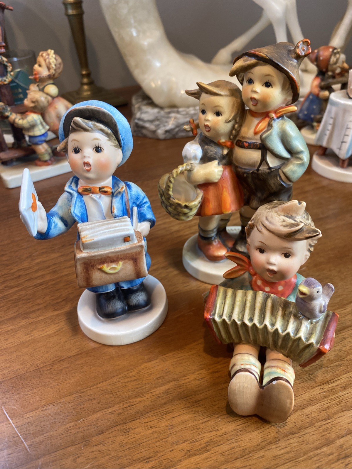 Lot Of 3 - TMK 3 1957-64 Goebel Hummel Figurines “Surpise” “Accordion” “Postman” Lot Of 3 - TMK 3 1957-64 Goebel Hummel Figurines “Surpise” “Accordion” “Postman”