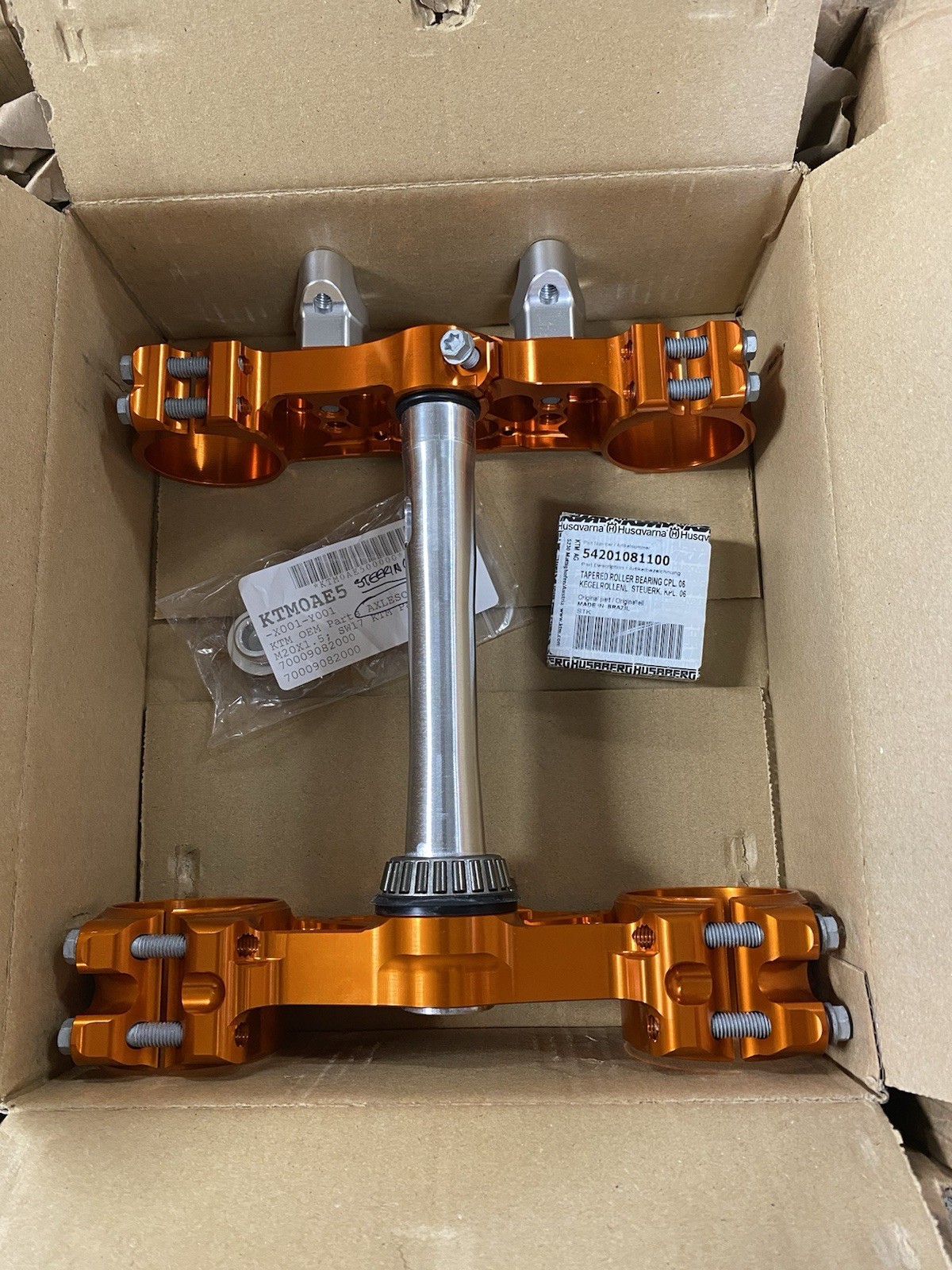 KTM Powerparts orange, anodized aluminum triple clamp kit with 22mm of offset
