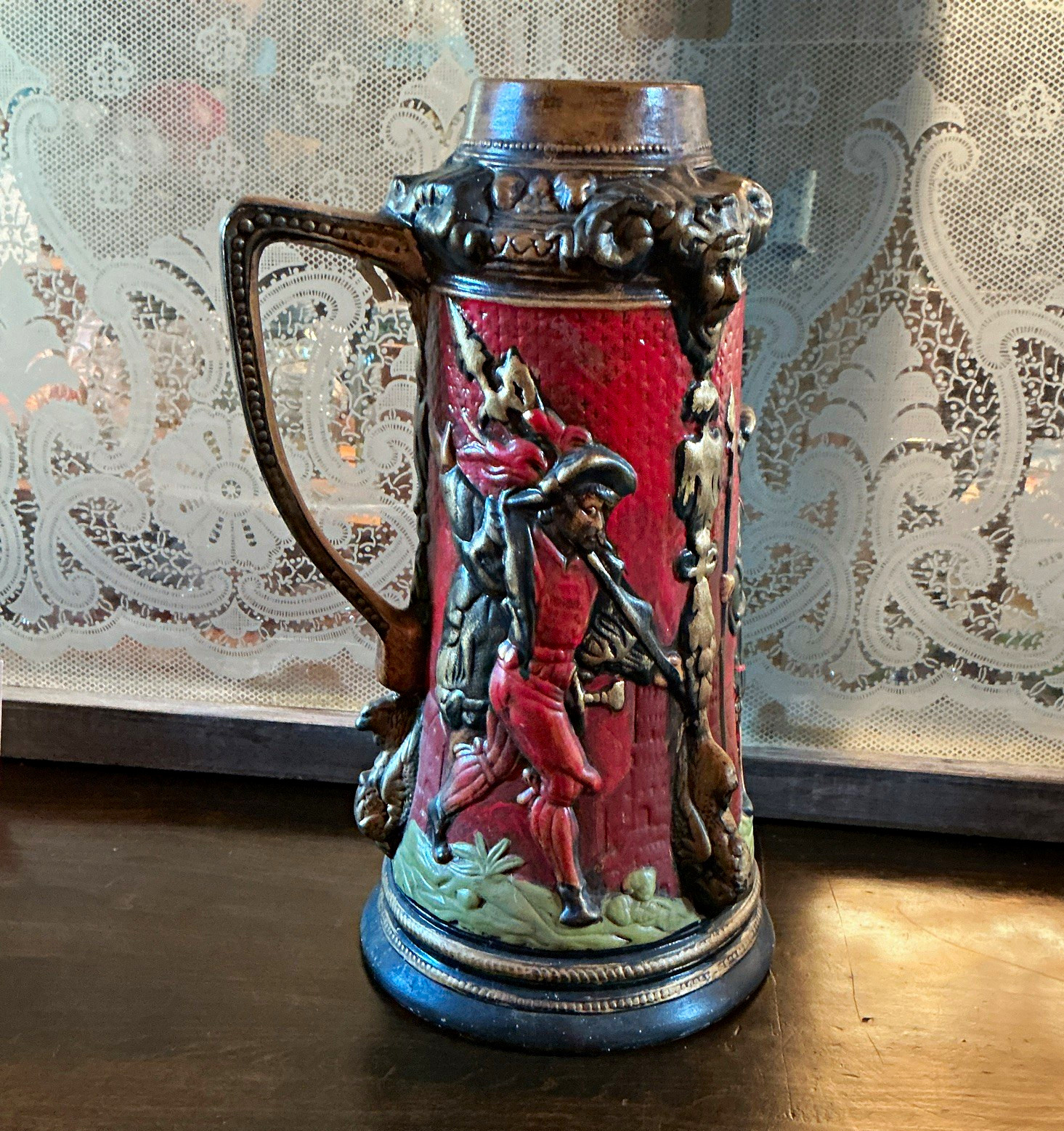 Vintage German ceramic beer stein featuring Renaissance lansquenet figures Vintage German ceramic beer stein featuring Renaissance lansquenet figures