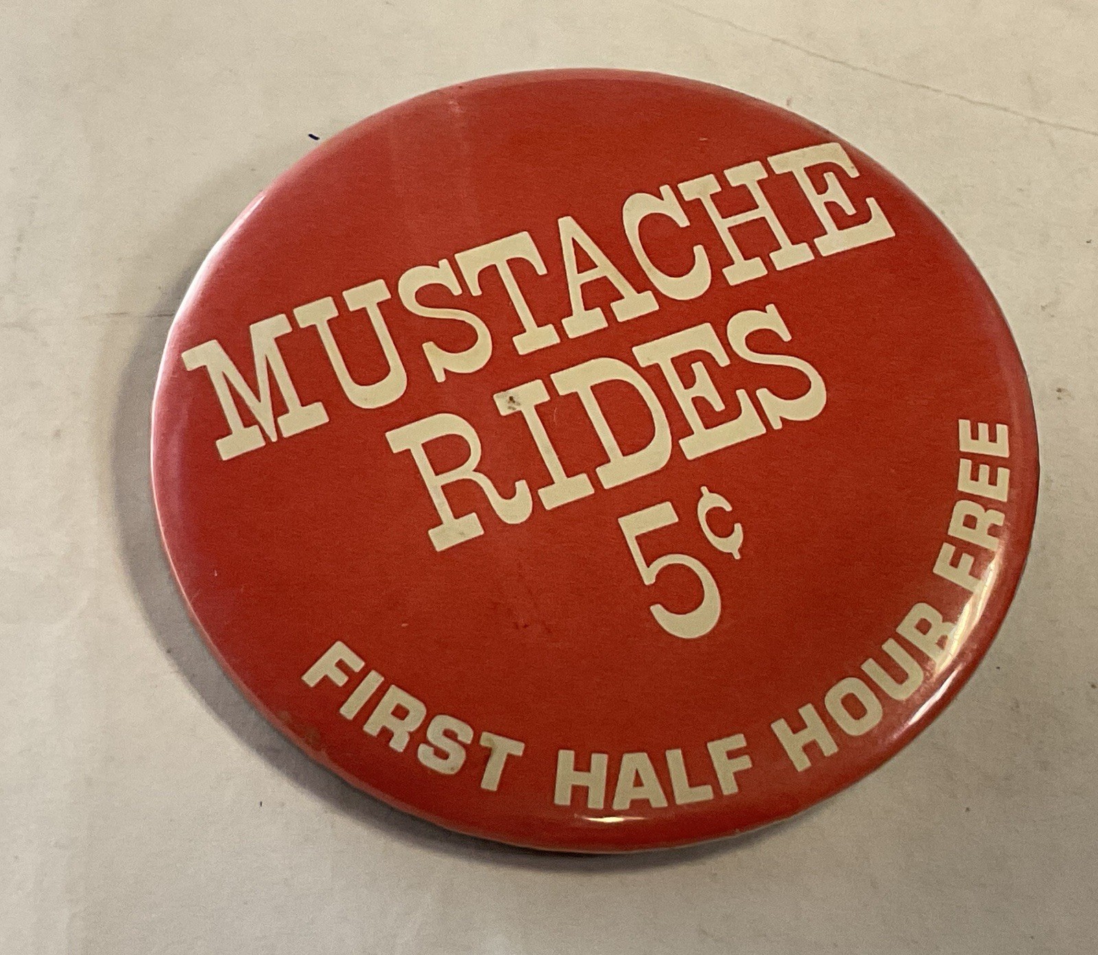 MUSTACHE RIDES .05 cents 1970's Pinback Button, 3