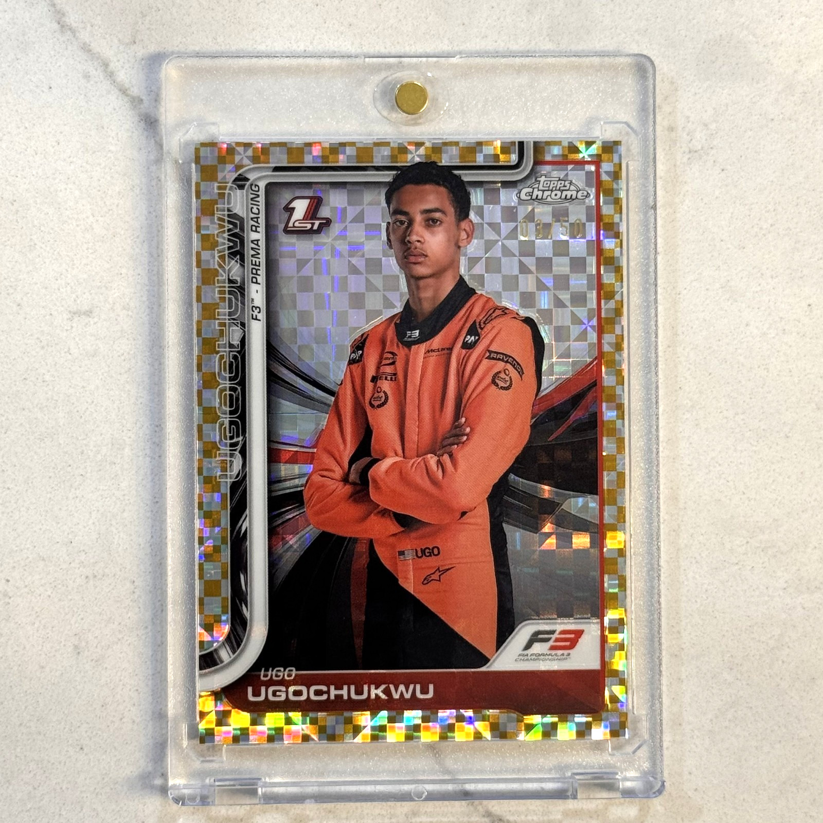 2025 Topps Chrome F1 #45 Ugo Ugochukwu 1st Gold Checker Flag Refractor /50