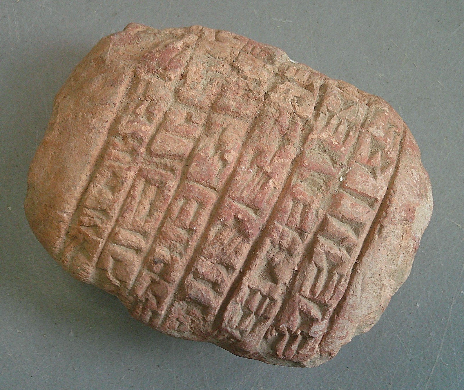 Near Eastern terracotta tablet with early form of writing