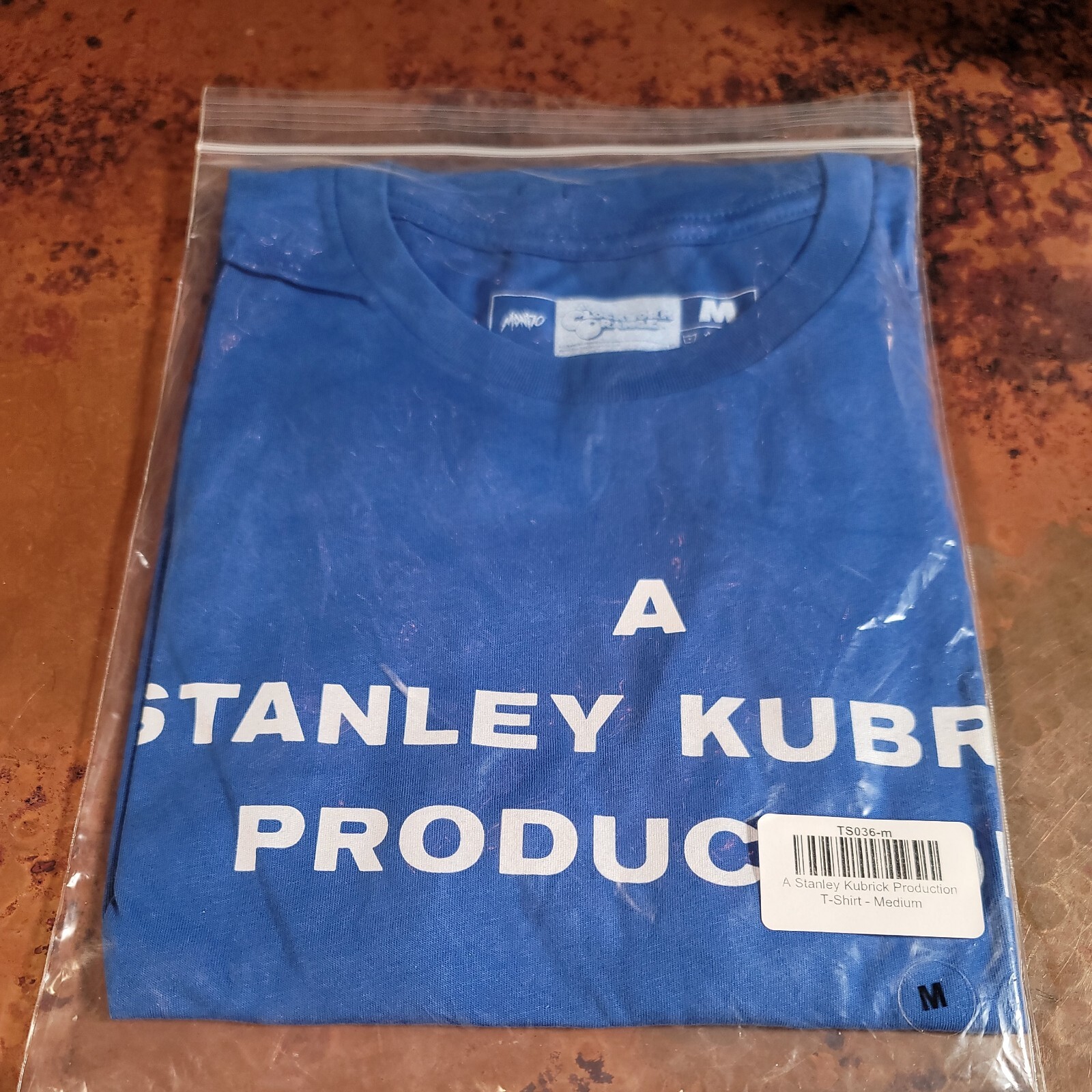 T-Shirt A Stanley Kubrick Production w/ Clockwork Orange logo Mondo Blue Medium T-Shirt A Stanley Kubrick Production w/ Clockwork Orange logo Mondo Blue Medium