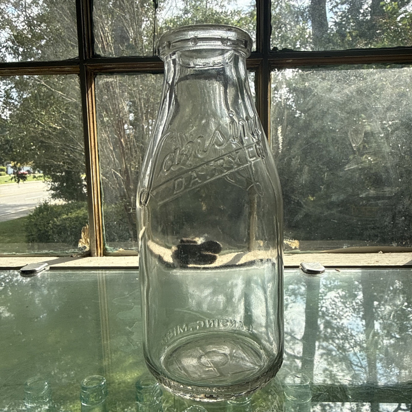 Lansing Dairy Co. Lansing, Mich.  One Pint Embossed Milk Bottle