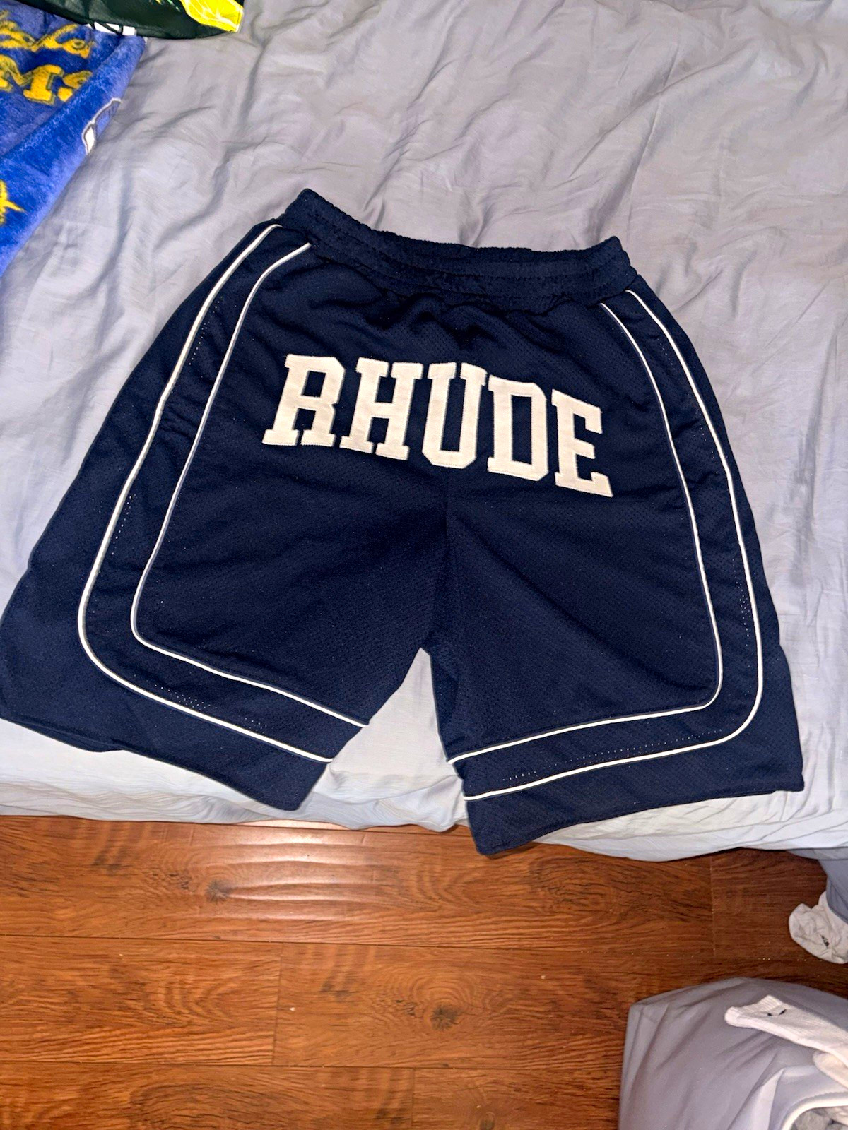 RHUDE Men\'s Blue Baggy Collegiate Logo Shorts RHUDE Men\'s Blue Baggy Collegiate Logo Shorts