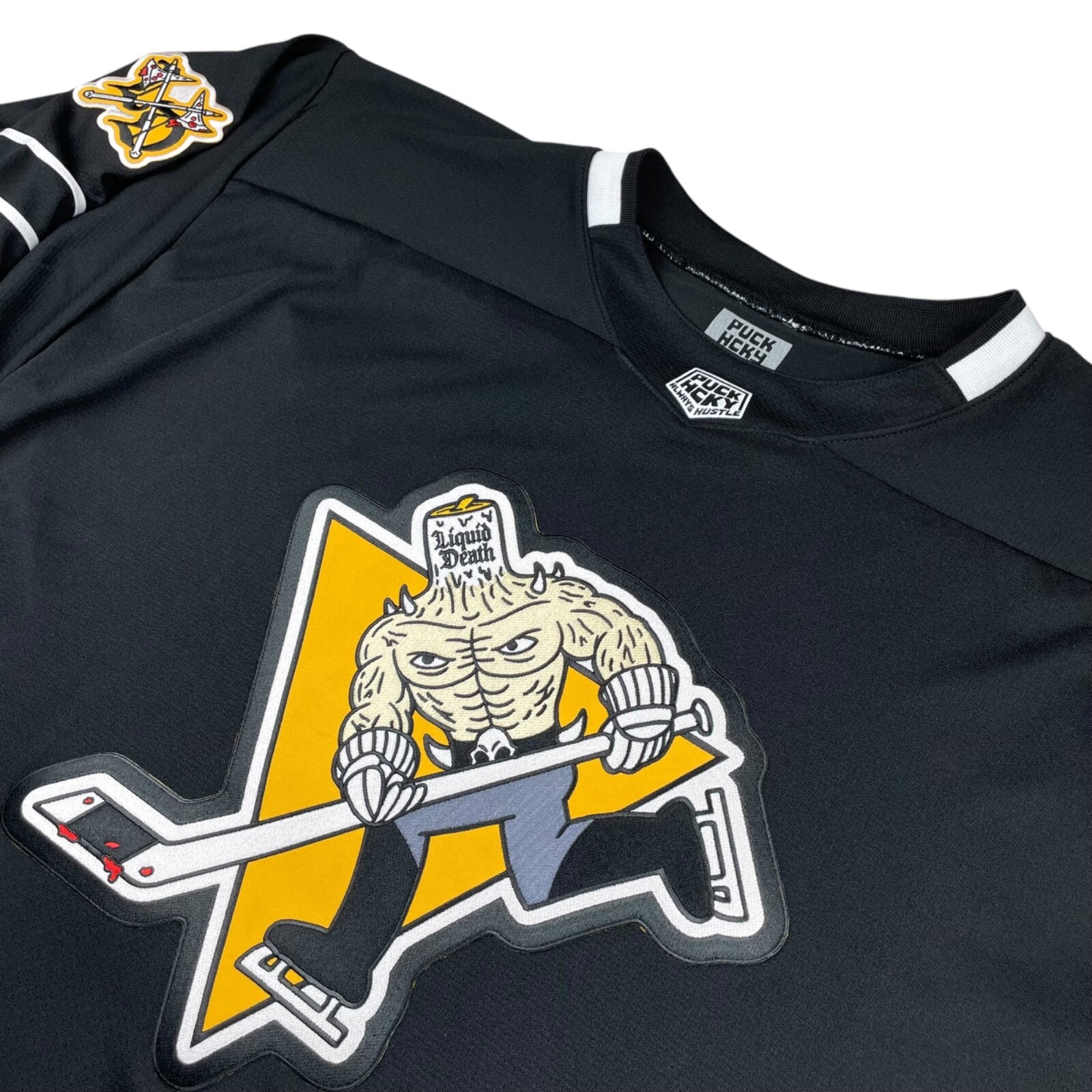 NEW Puck Hcky x Liquid Death #66 Men's Hockey Jersey Black/White • Large NEW Puck Hcky x Liquid Death #66 Men's Hockey Jersey Black/White • Large