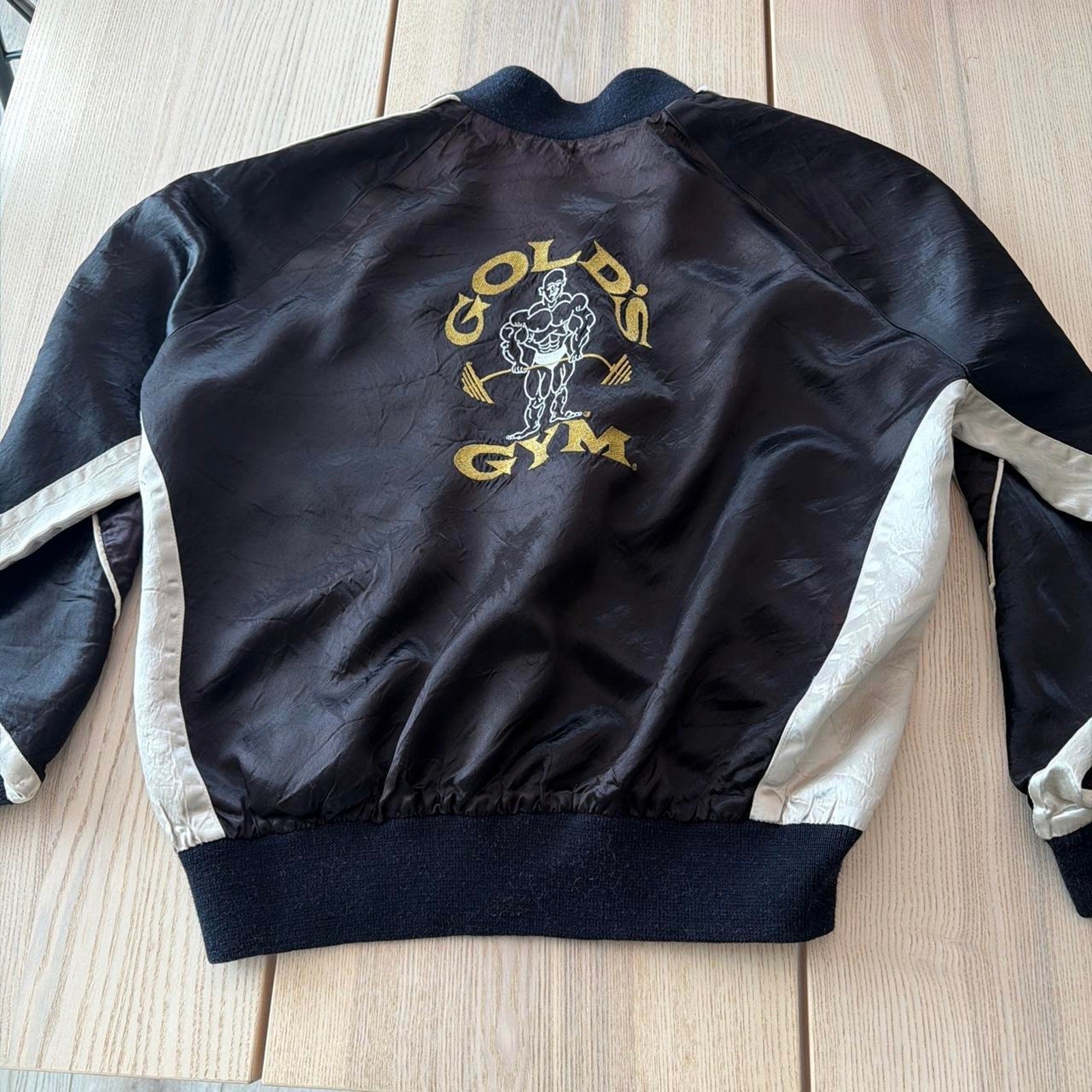 Vintage golds gym black bomber