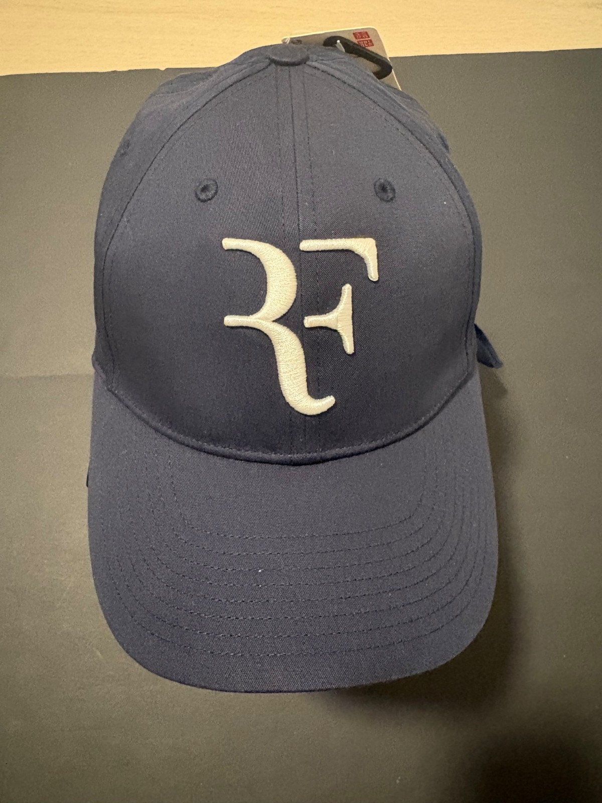 Brand New Limited Edition Roger Federer Uniqlo Dark Navy Blue White Hat / Cap Brand New Limited Edition Roger Federer Uniqlo Dark Navy Blue White Hat / Cap