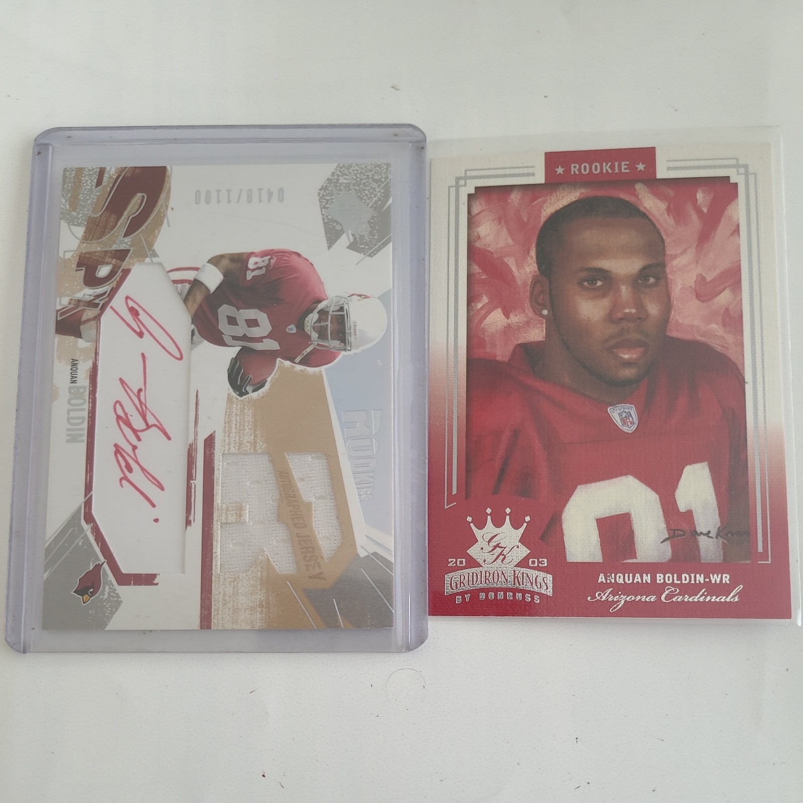 Anquan Boldin signed/auto\'d 2003 spx red rookie, auto, jersey, #/1100, plus rc