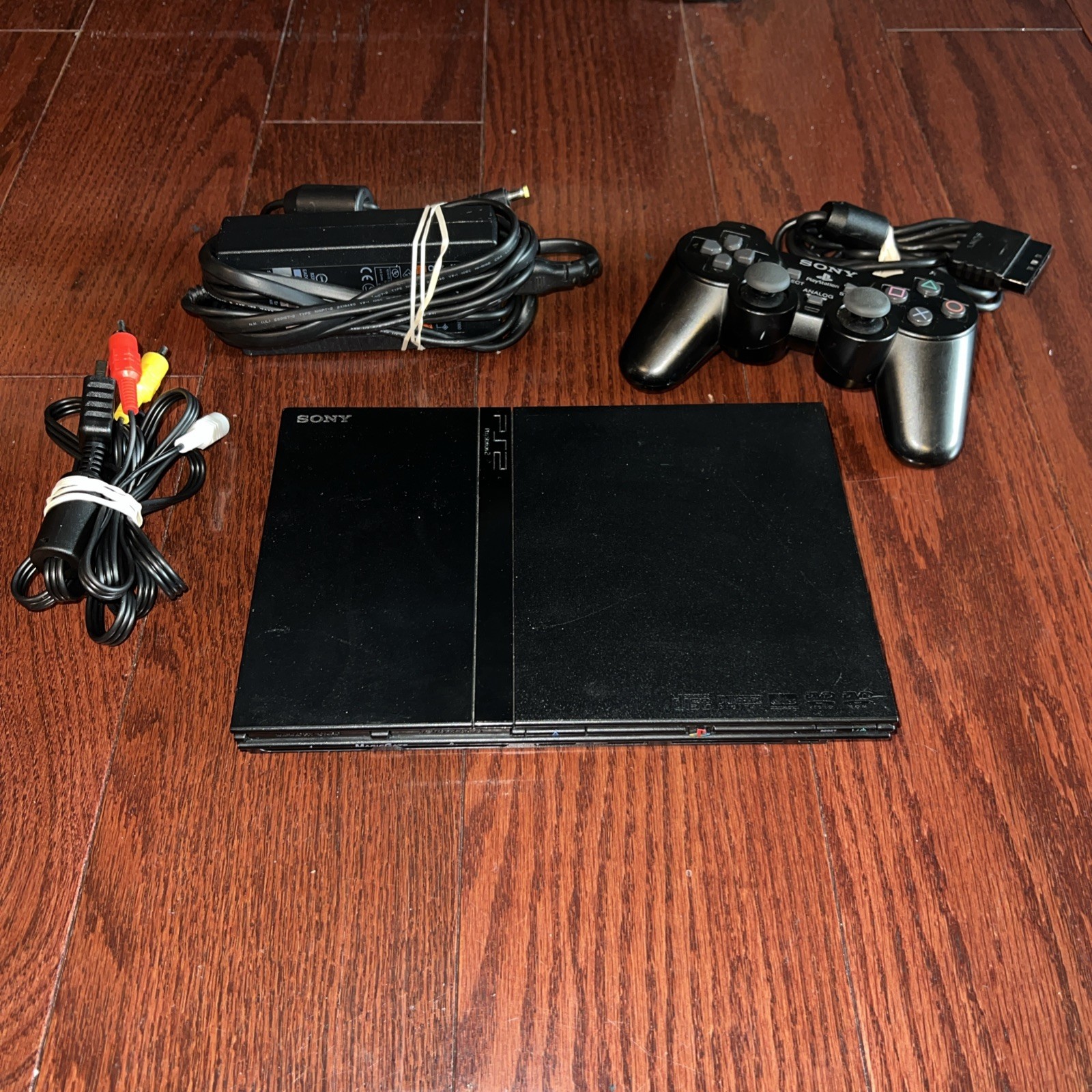 Sony PlayStation 2 PS2 Slim Console & Remote Black Tested OEM Complete Sony PlayStation 2 PS2 Slim Console & Remote Black Tested OEM Complete