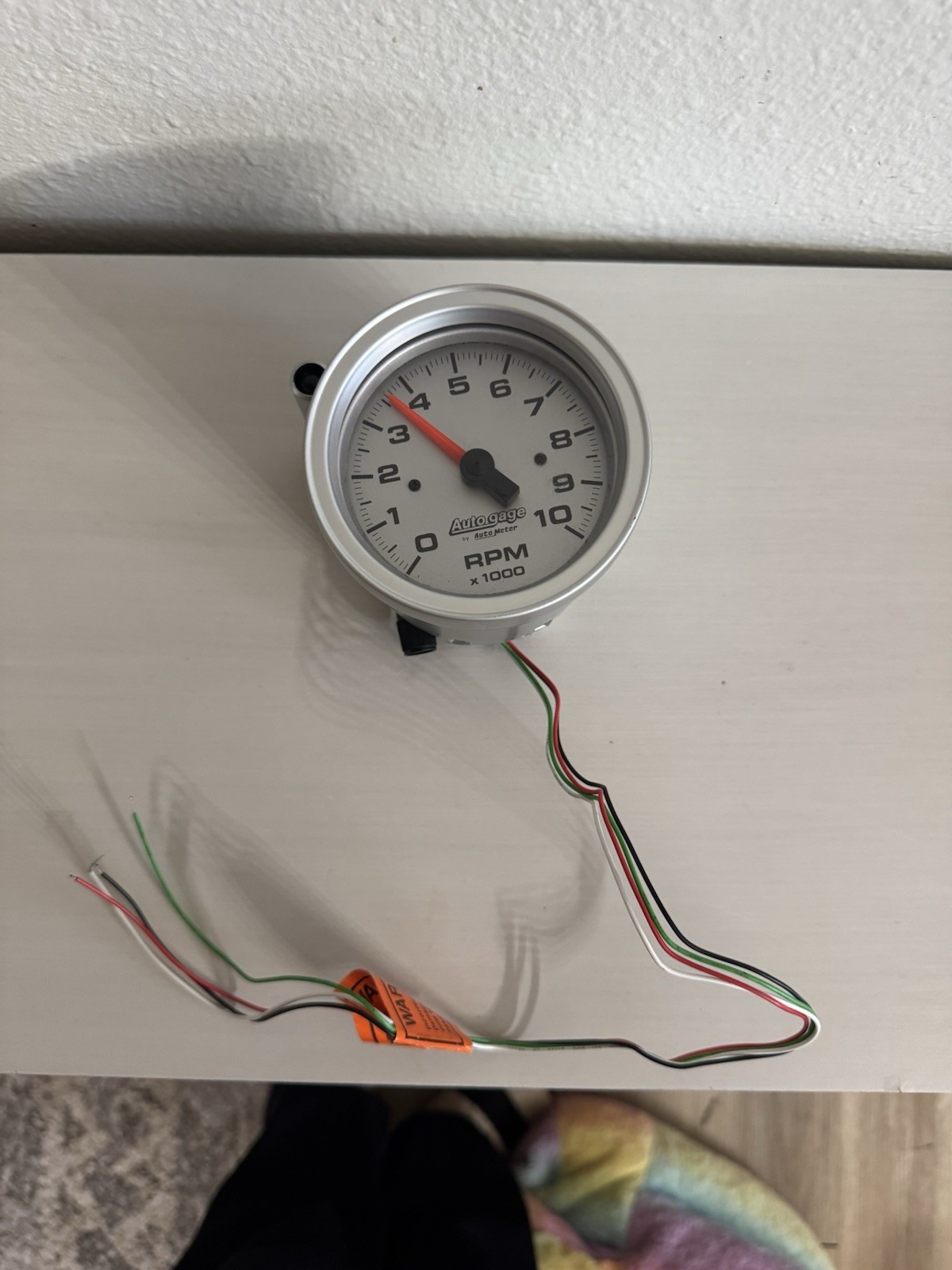 NEW Auto Meter Auto Gage Tachometer 0–10,000 RPM – Silver