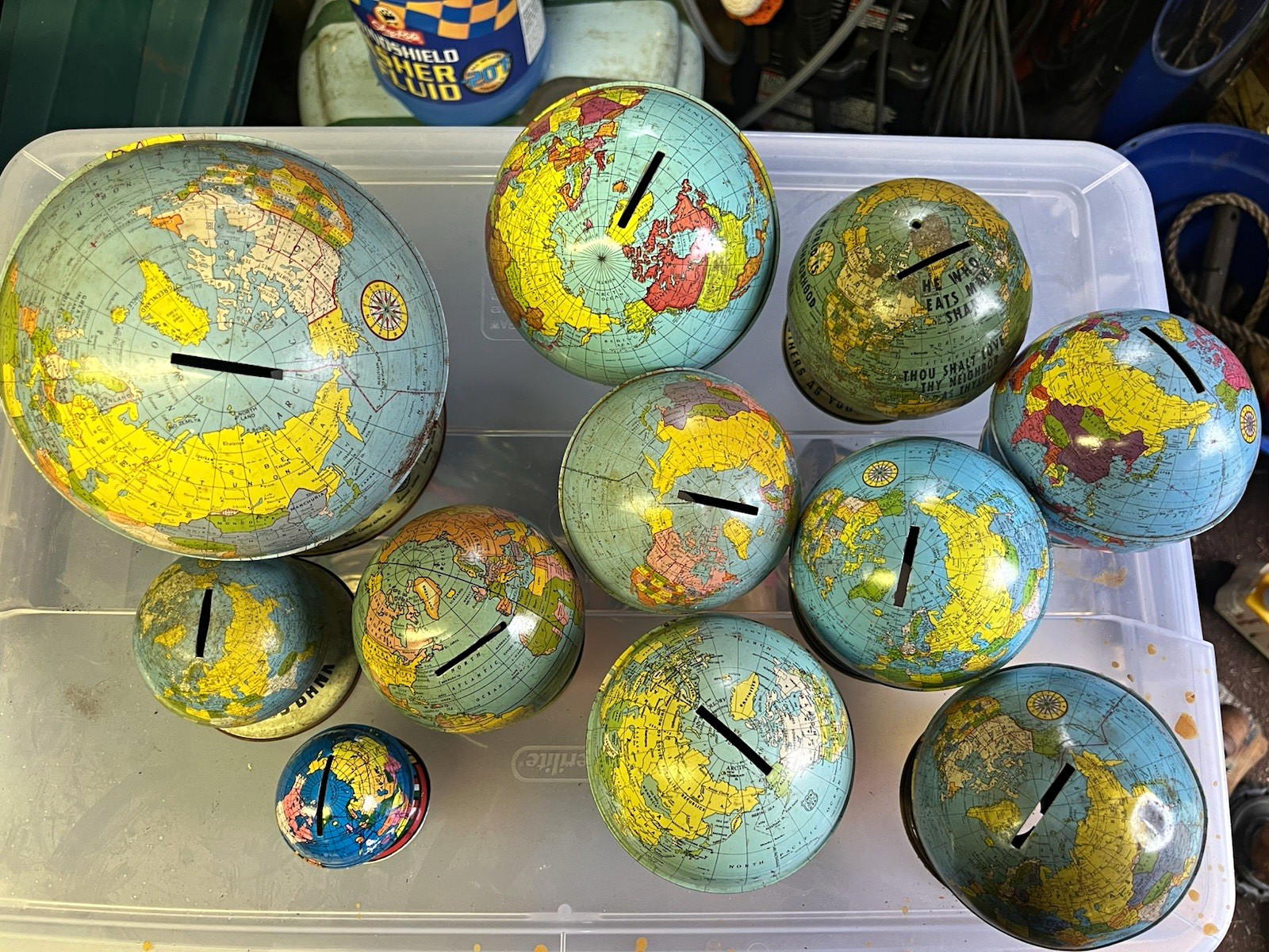 Lot of vintage tin litho globe coin banks Lot of vintage tin litho globe coin banks