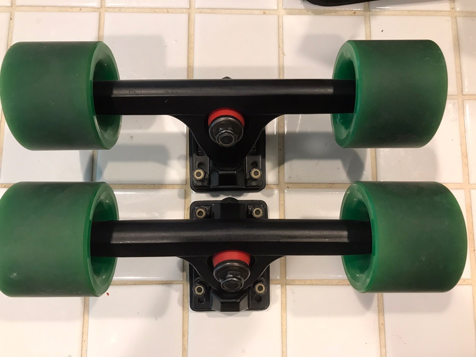 Caliber .50 Cal. Longboard Trucks With ABEC 11 Grippins Wheels Caliber .50 Cal. Longboard Trucks With ABEC 11 Grippins Wheels