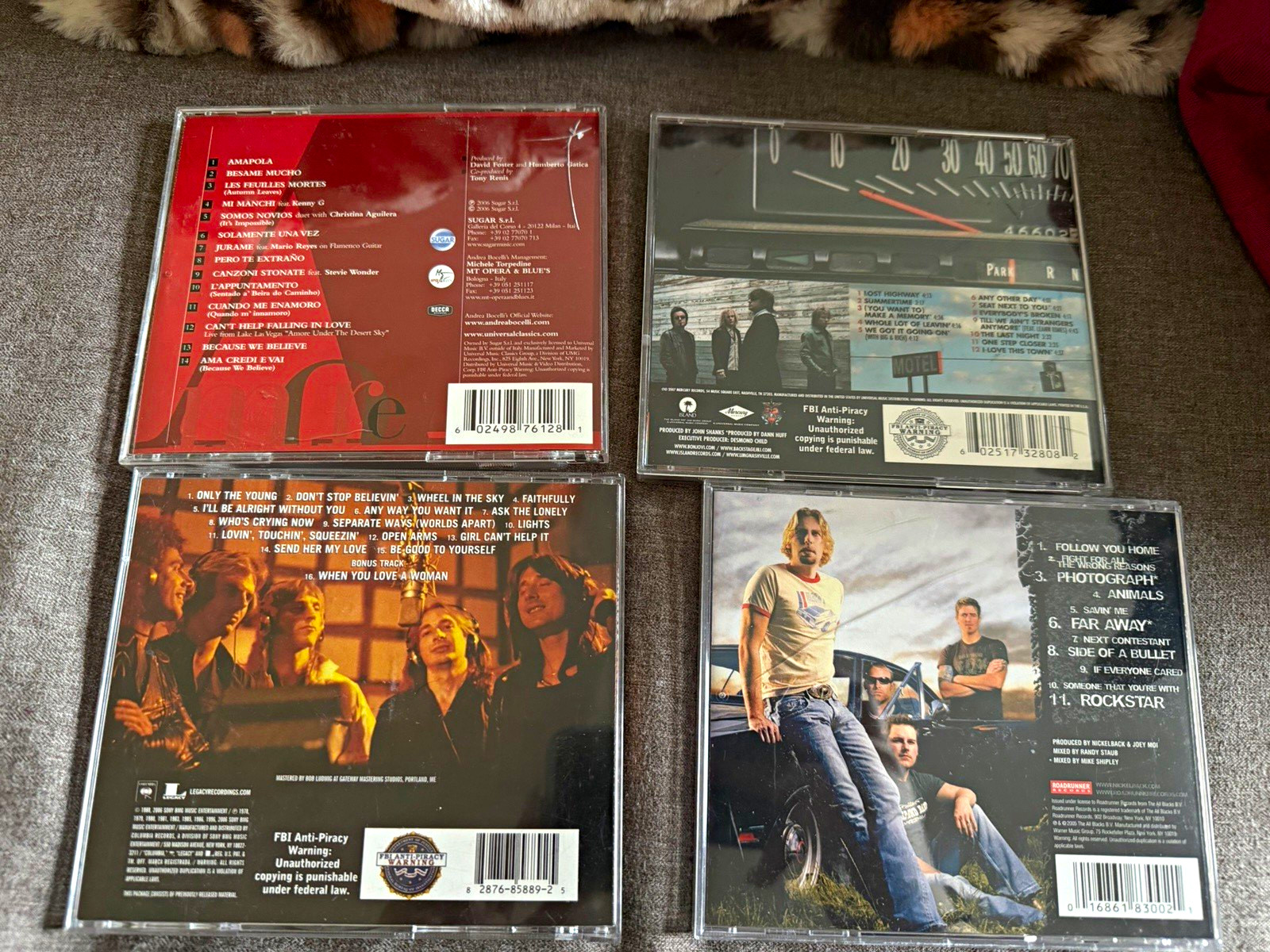 Set of 4 CDs (Andrea Bocelli, Nickelback, Bon Jovi, and Journey)