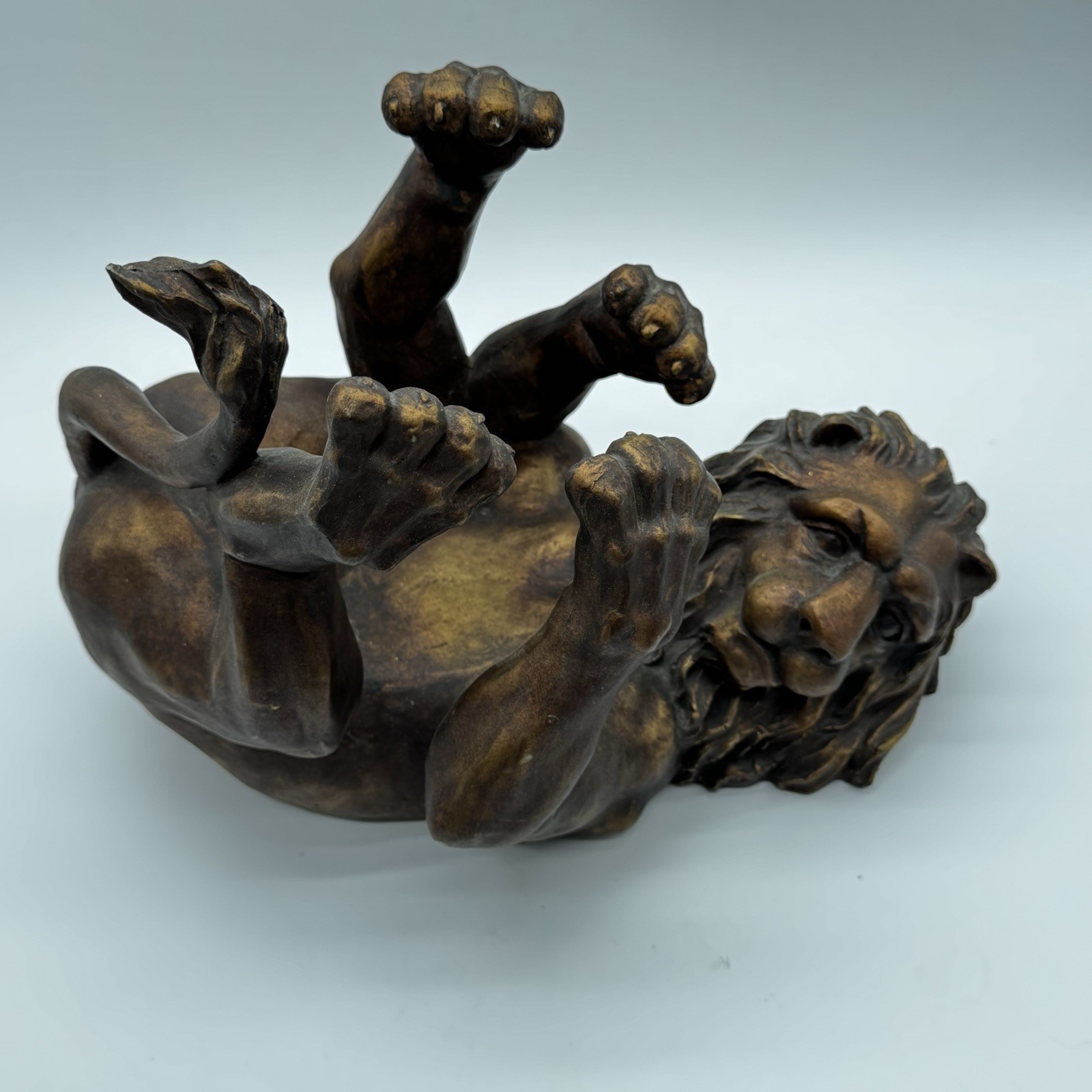 Antiqued Bronze Lion Sculpture Playful Cradling Big Cat Countertop Art Barware