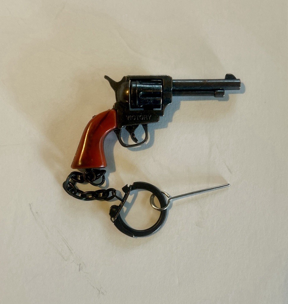 Vintage Victory Toy Cap Revolver Pistol Key Chain/ Made In Hong Kong-NOS Vintage Victory Toy Cap Revolver Pistol Key Chain/ Made In Hong Kong-NOS