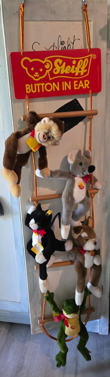 Steiff animals on a rope ladder store display. Steiff animals on a rope ladder store display.