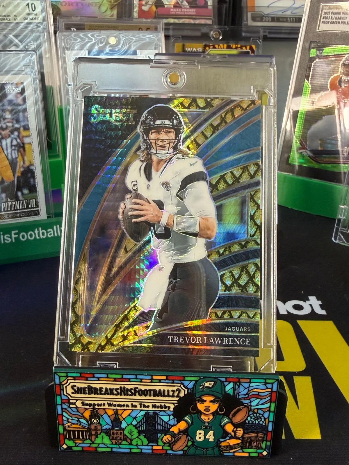 2025 Select Trevor Lawrence Gold Dragon Scale Prizm /10 Jacksonville Jaguars NFL